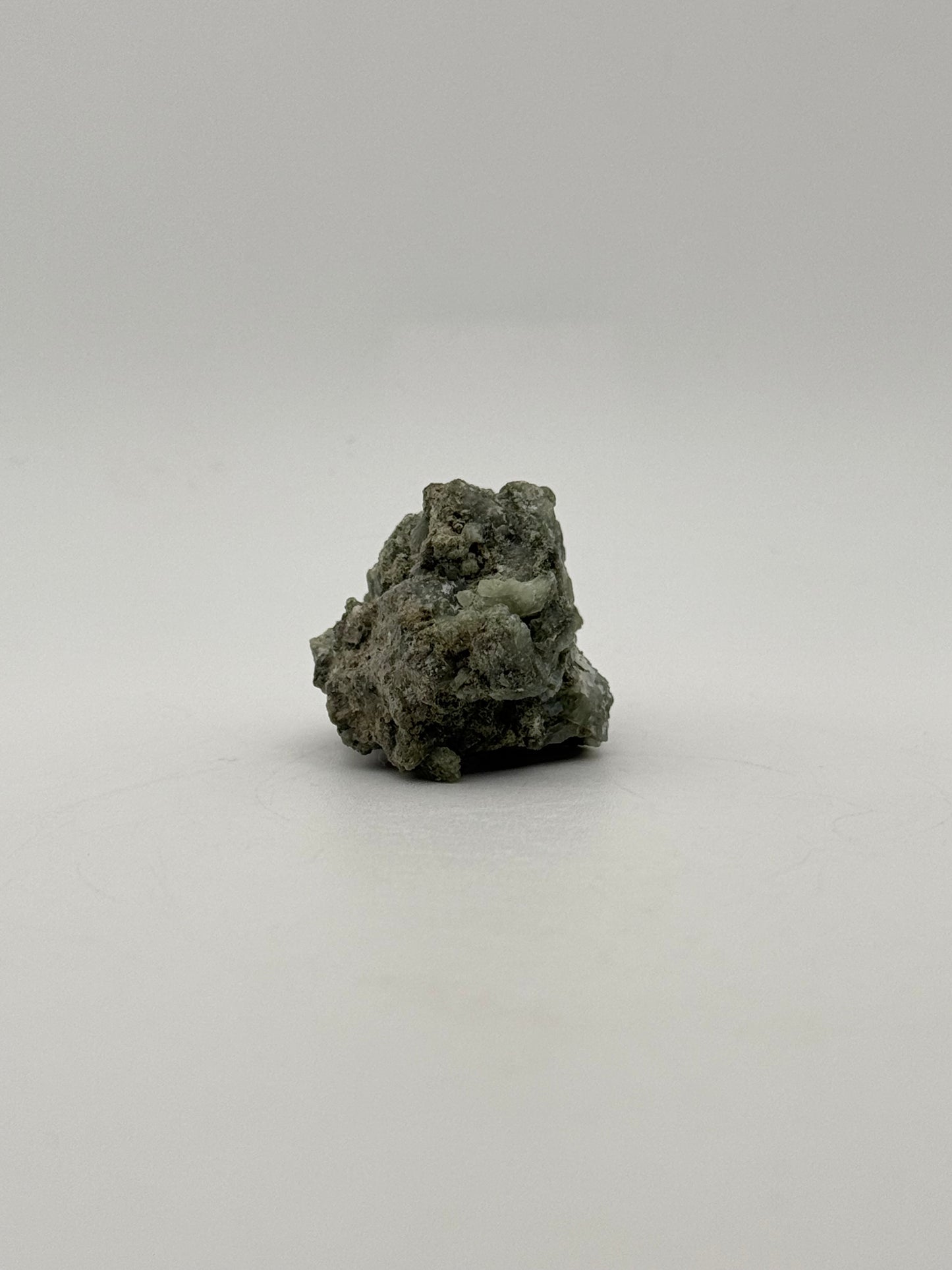 Raw prehnite specimen with amazing green color.