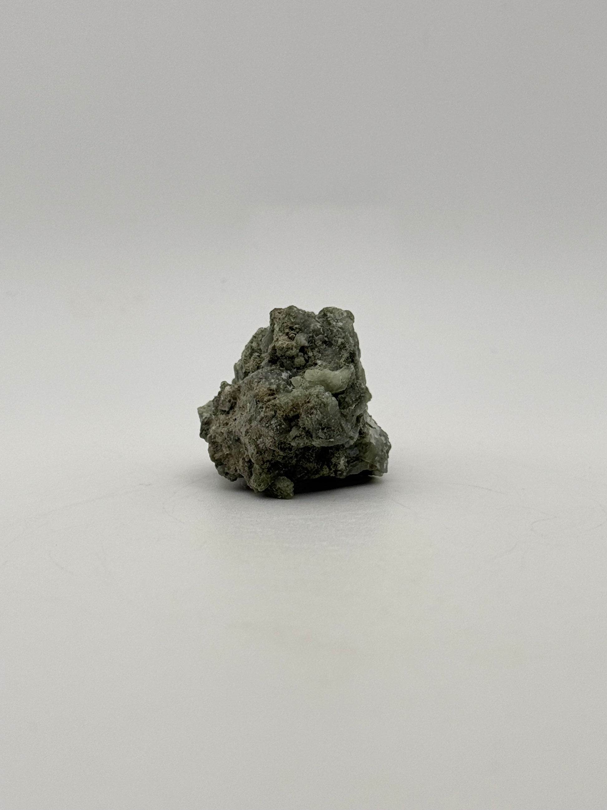 Raw prehnite specimen with amazing green color.