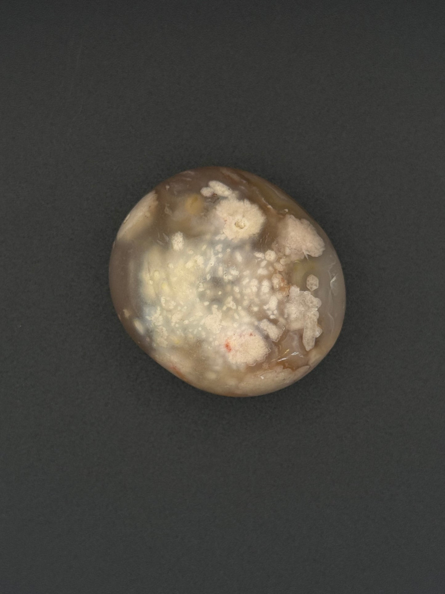 Flower agate polished crystal palm stone.