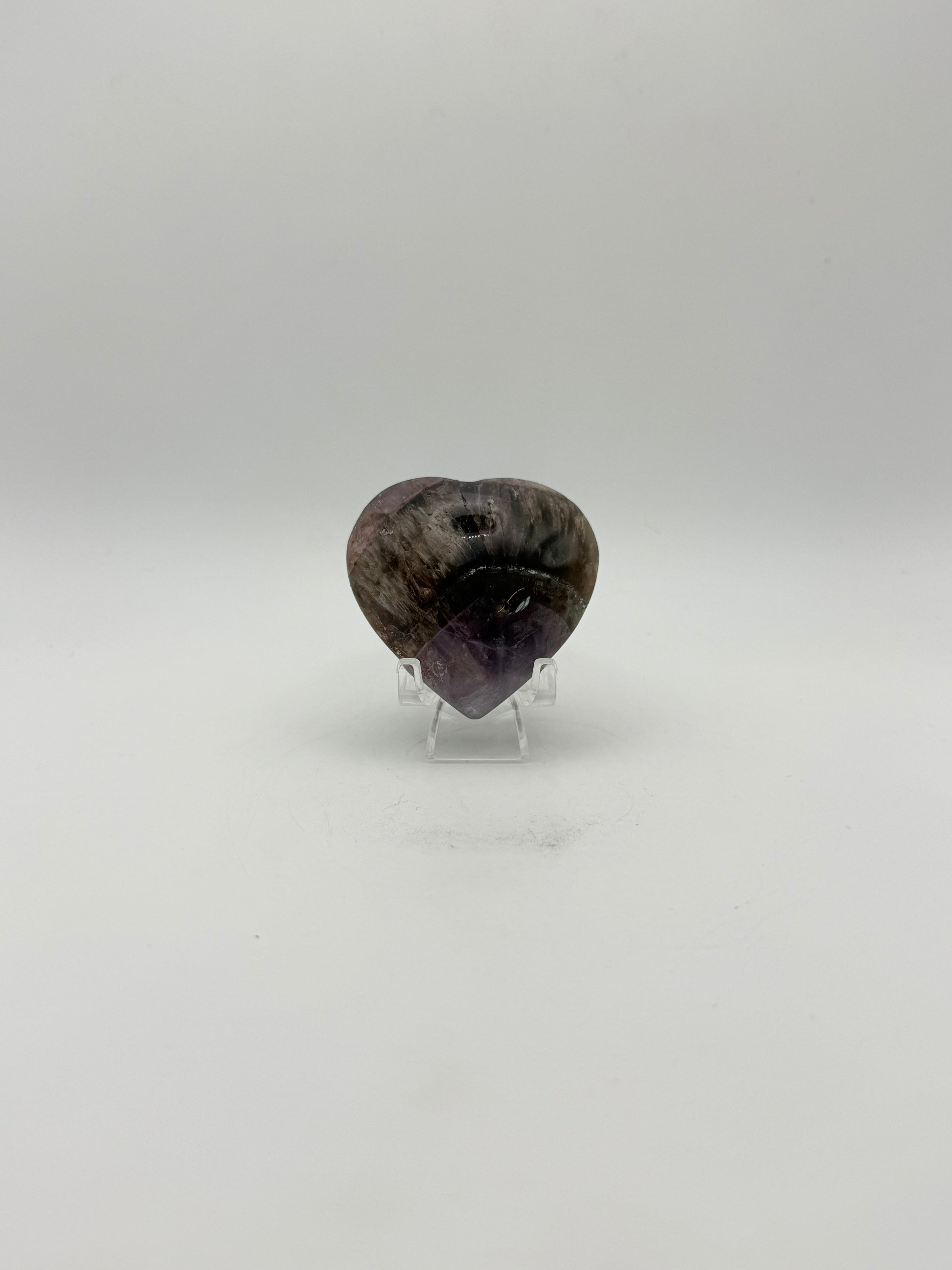 Polished super 7 in the shape of a heart.