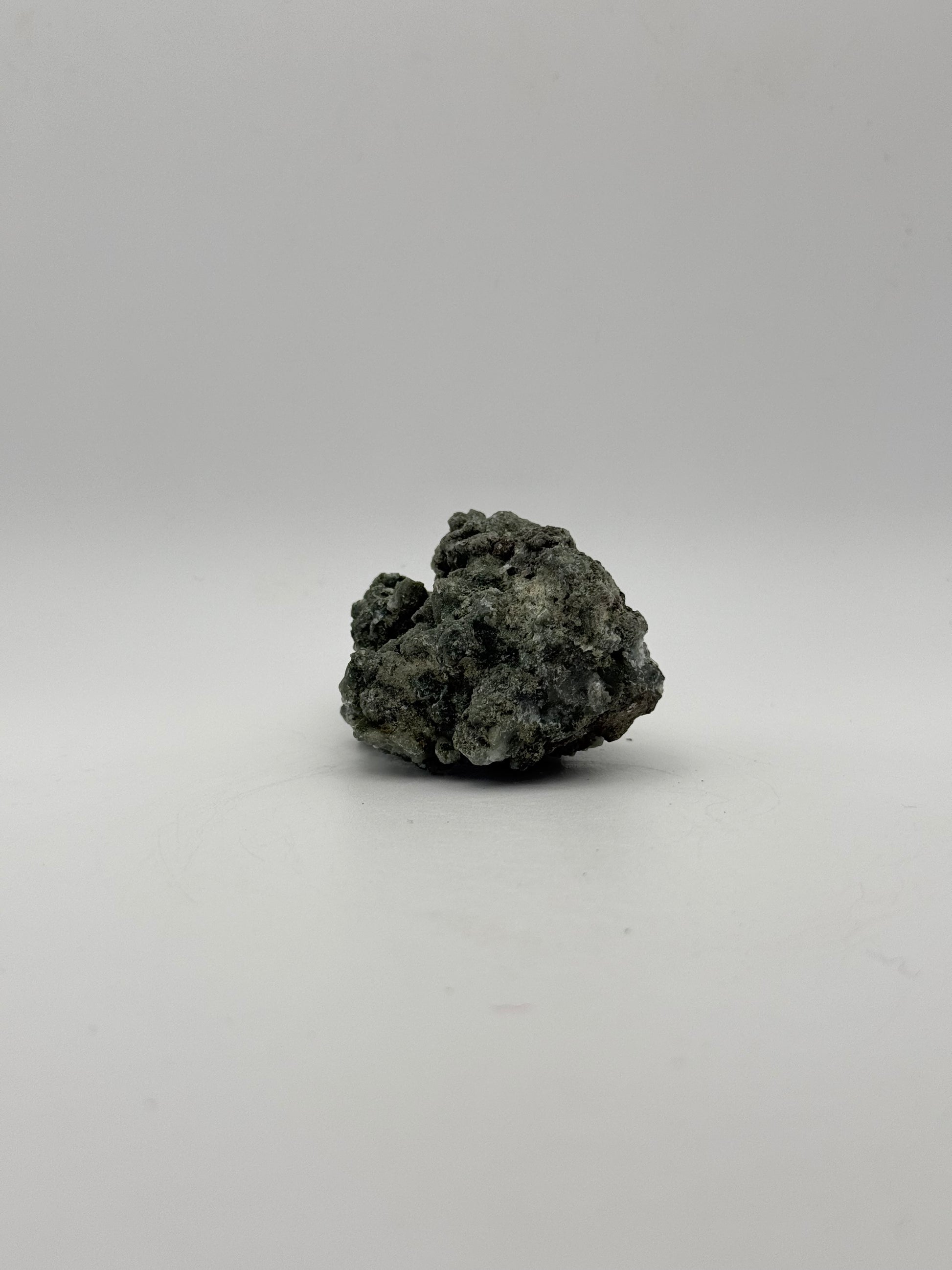 Raw prehnite specimen with amazing green color.