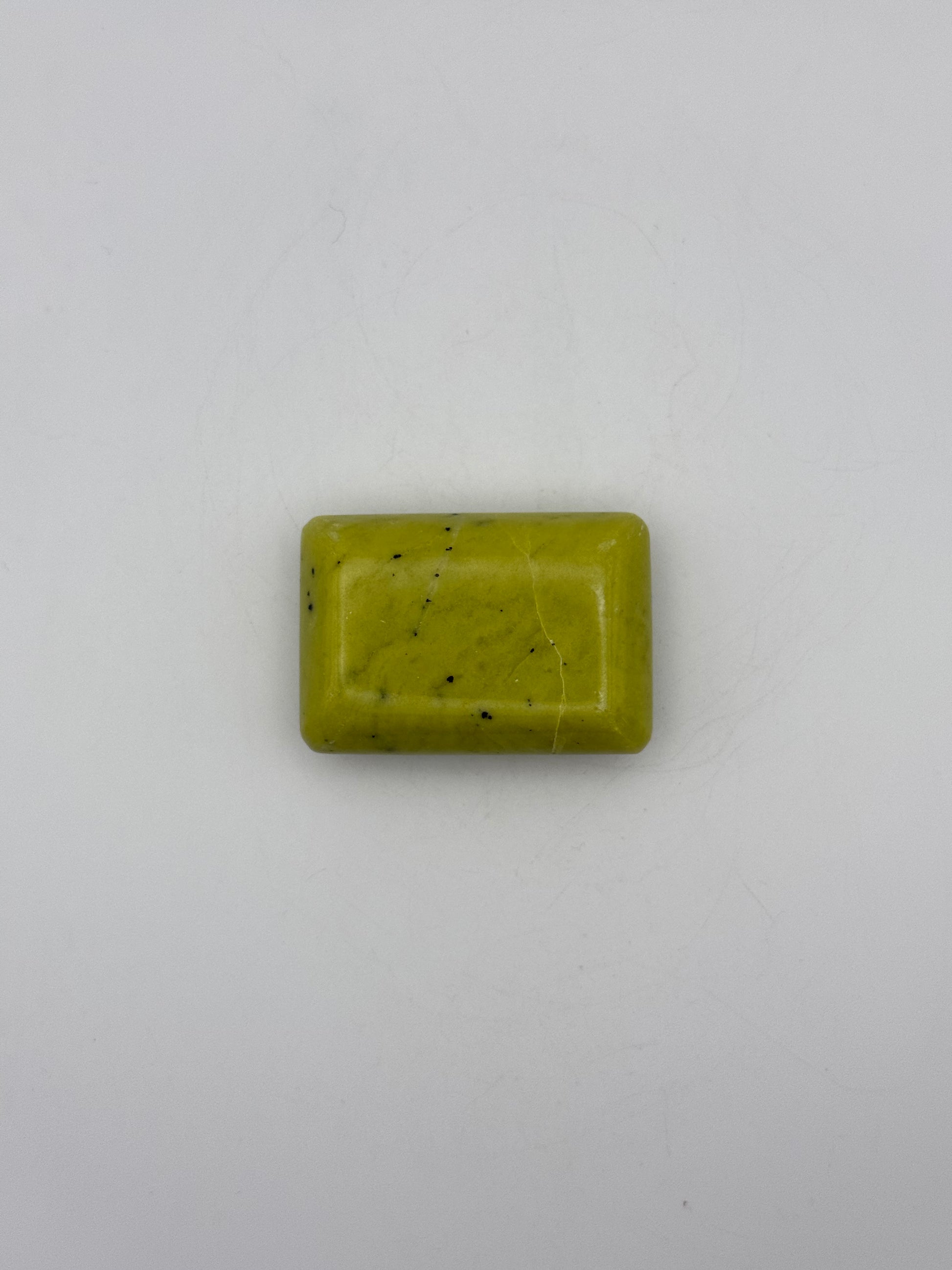 Polished healerite in the shape of a rectangular soap.