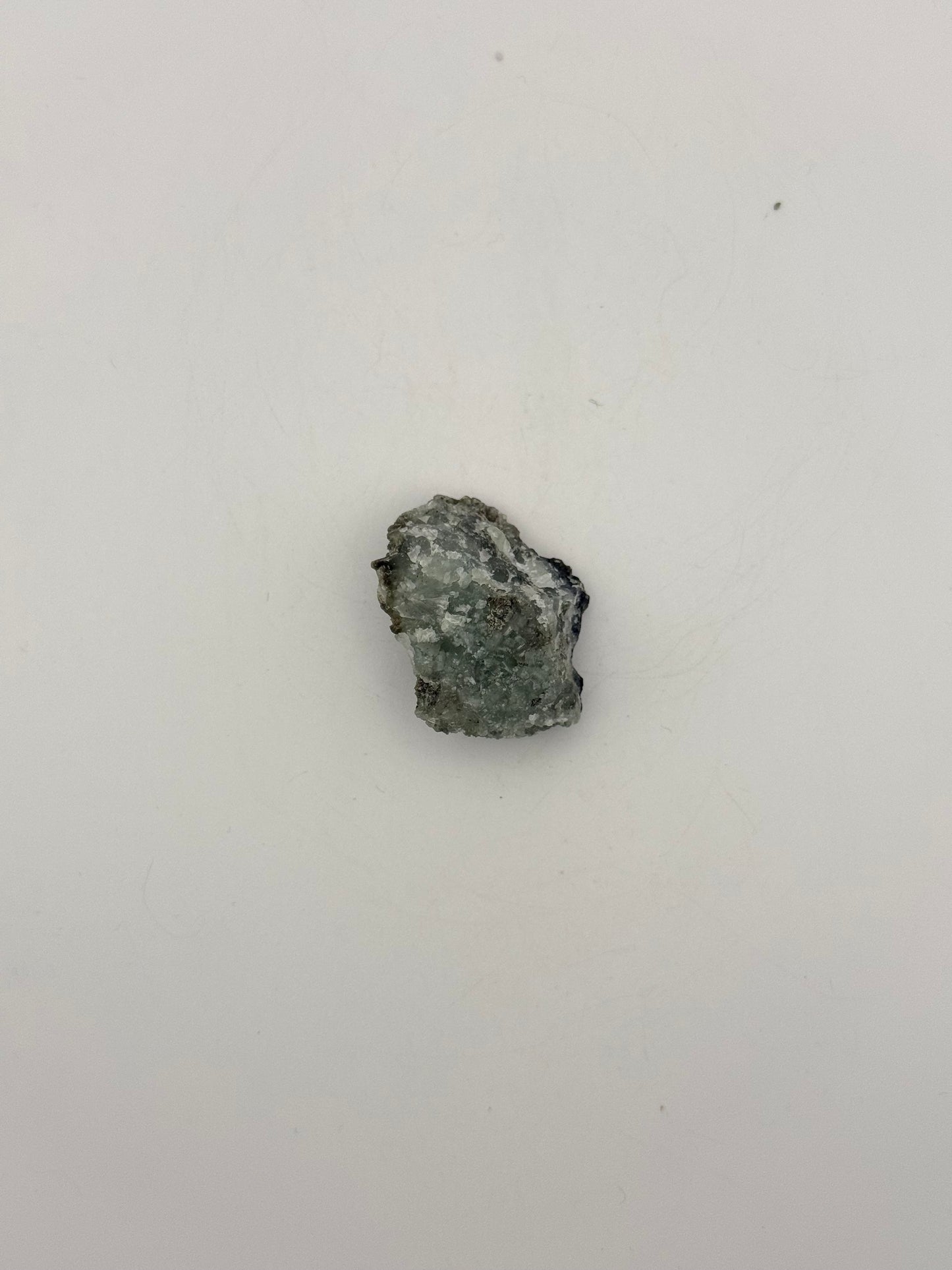 Raw prehnite specimen with amazing green color.