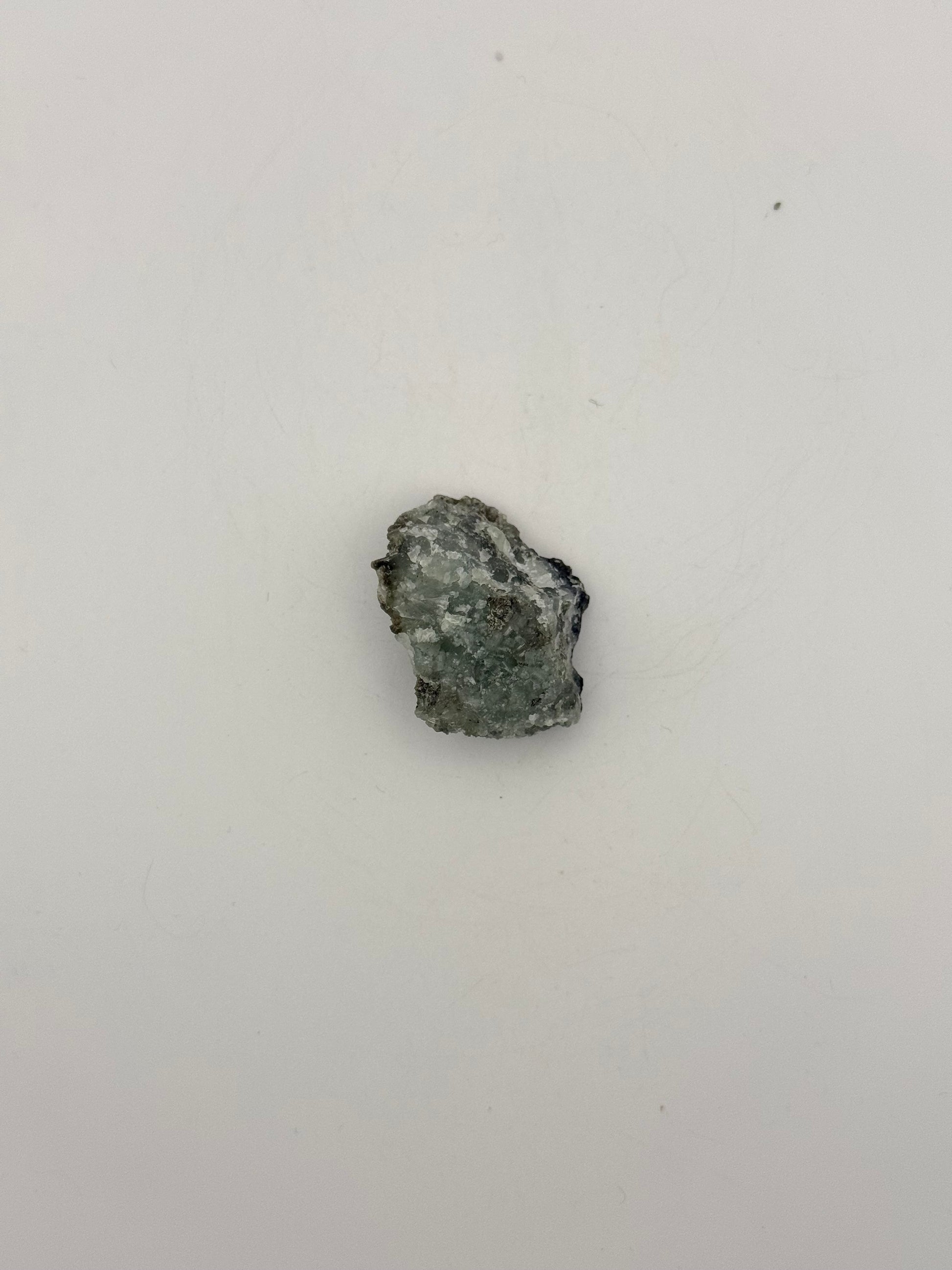 Raw prehnite specimen with amazing green color.