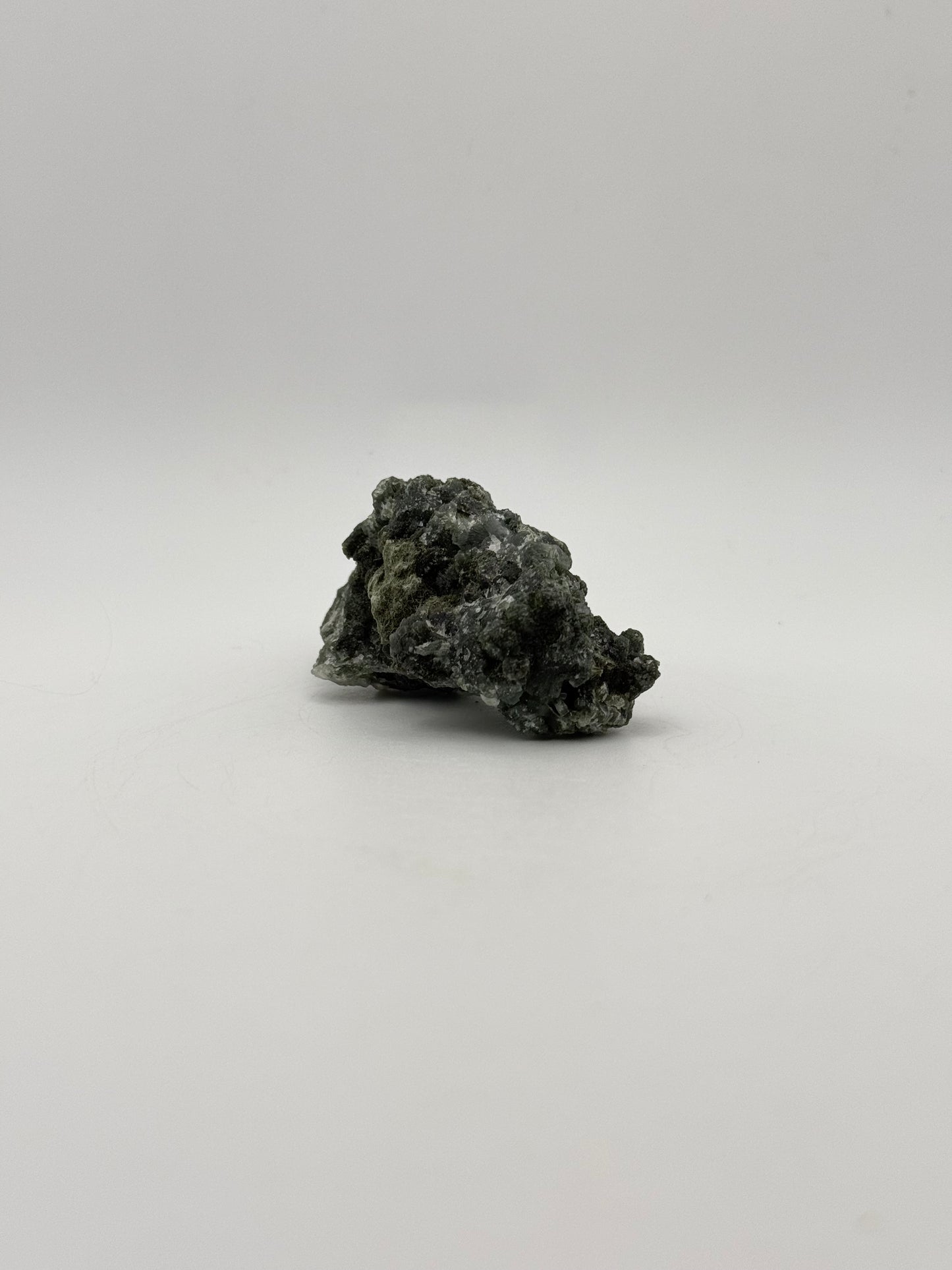 Raw prehnite specimen with amazing green color.