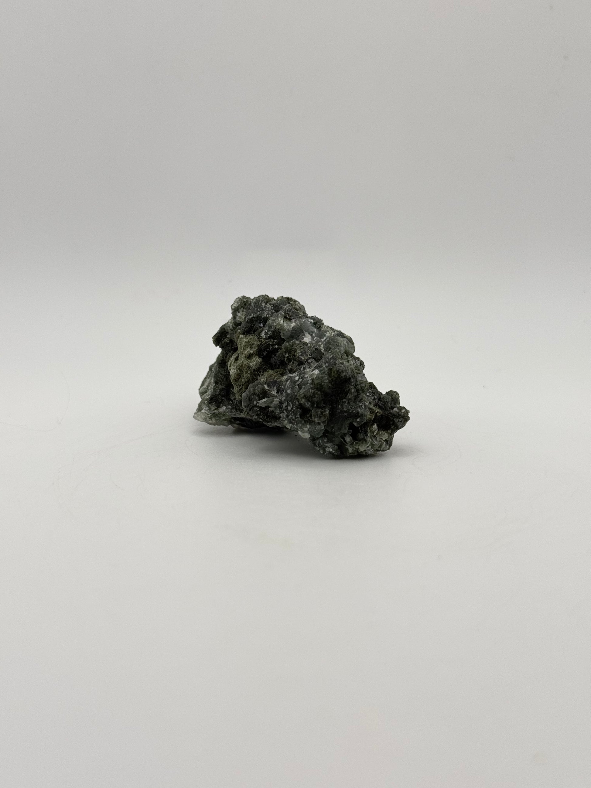 Raw prehnite specimen with amazing green color.