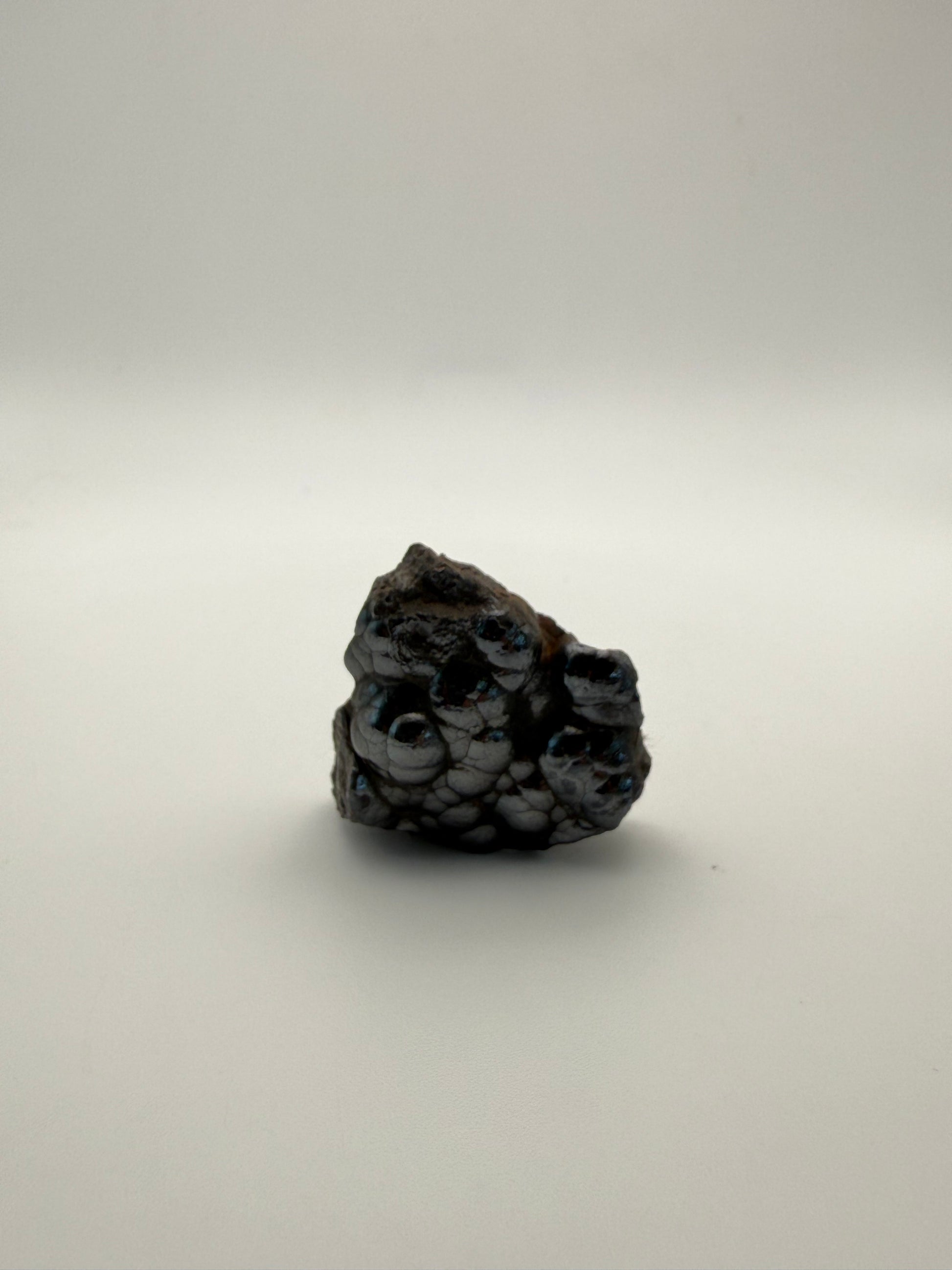 Small raw hematite specimen.