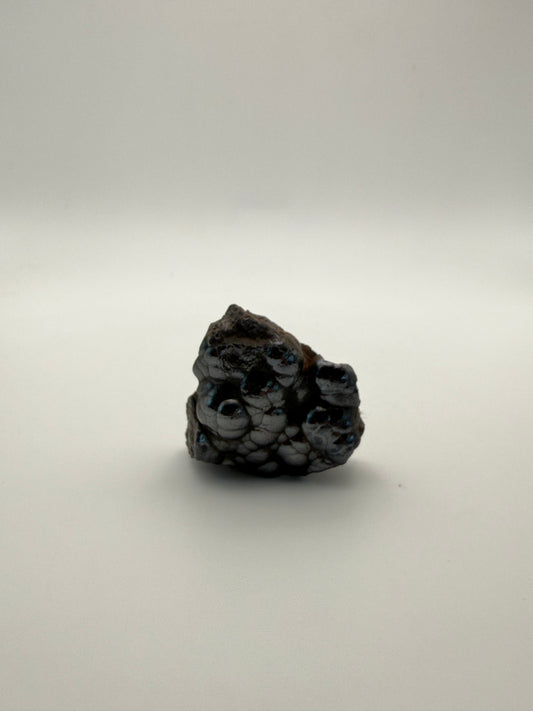 Small raw hematite specimen.