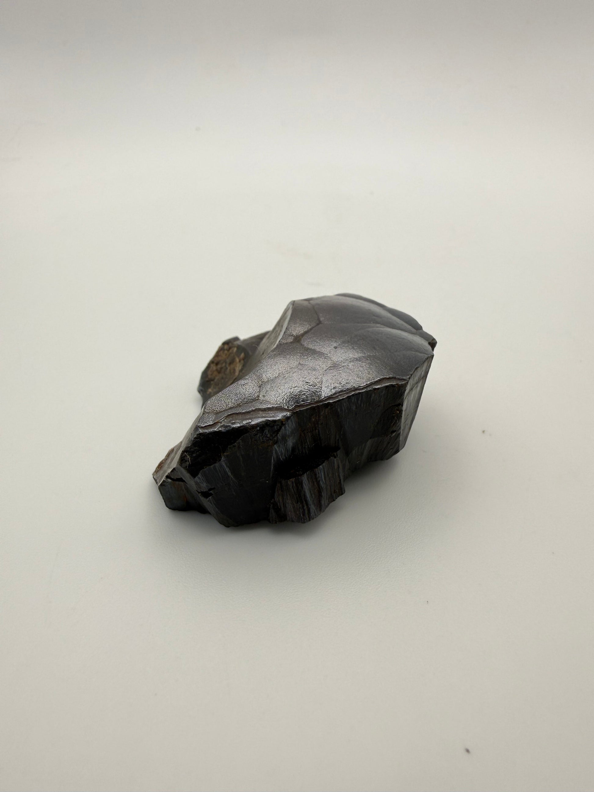 Small raw hematite specimen.