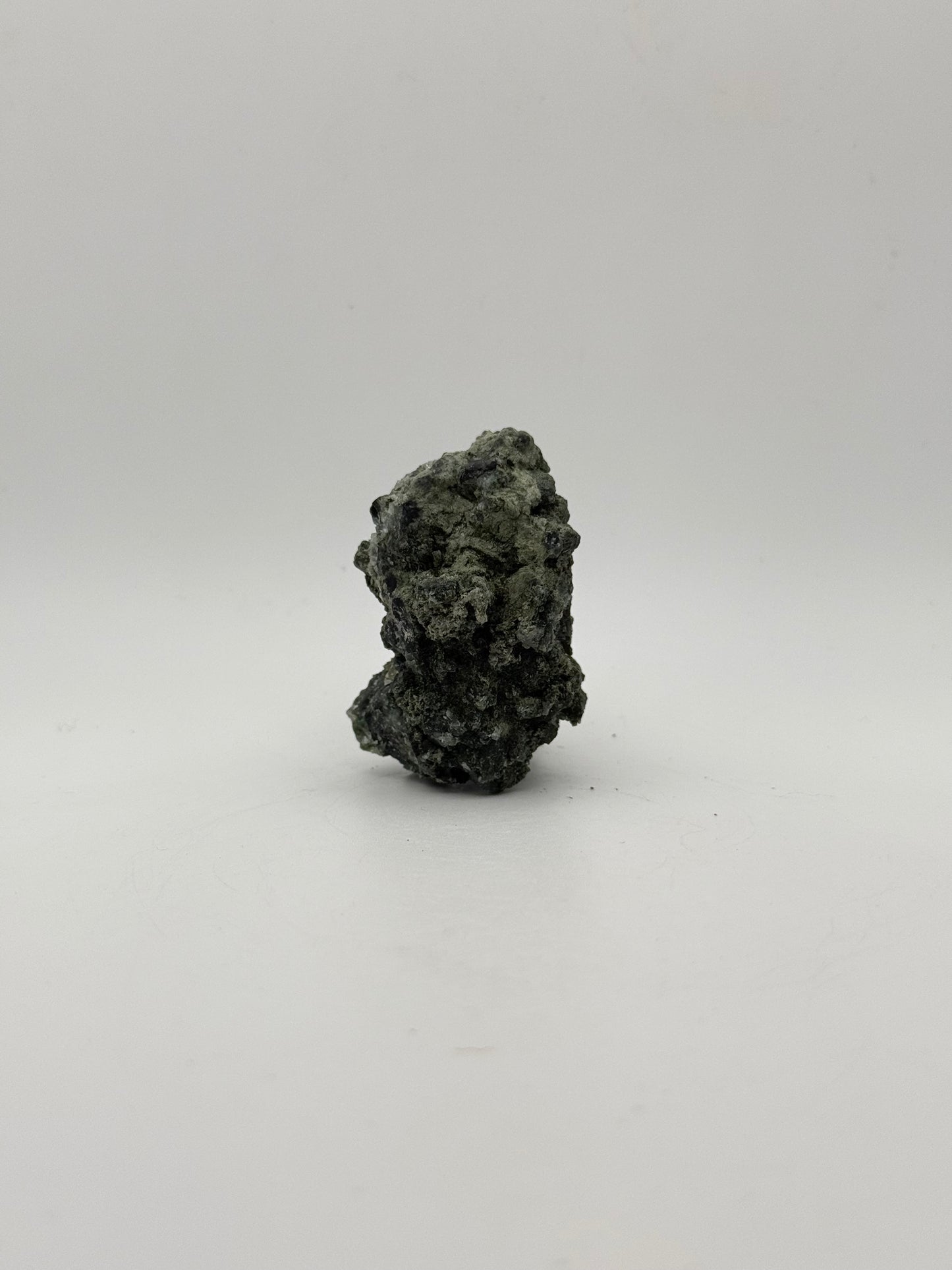 Raw prehnite specimen with amazing green color.