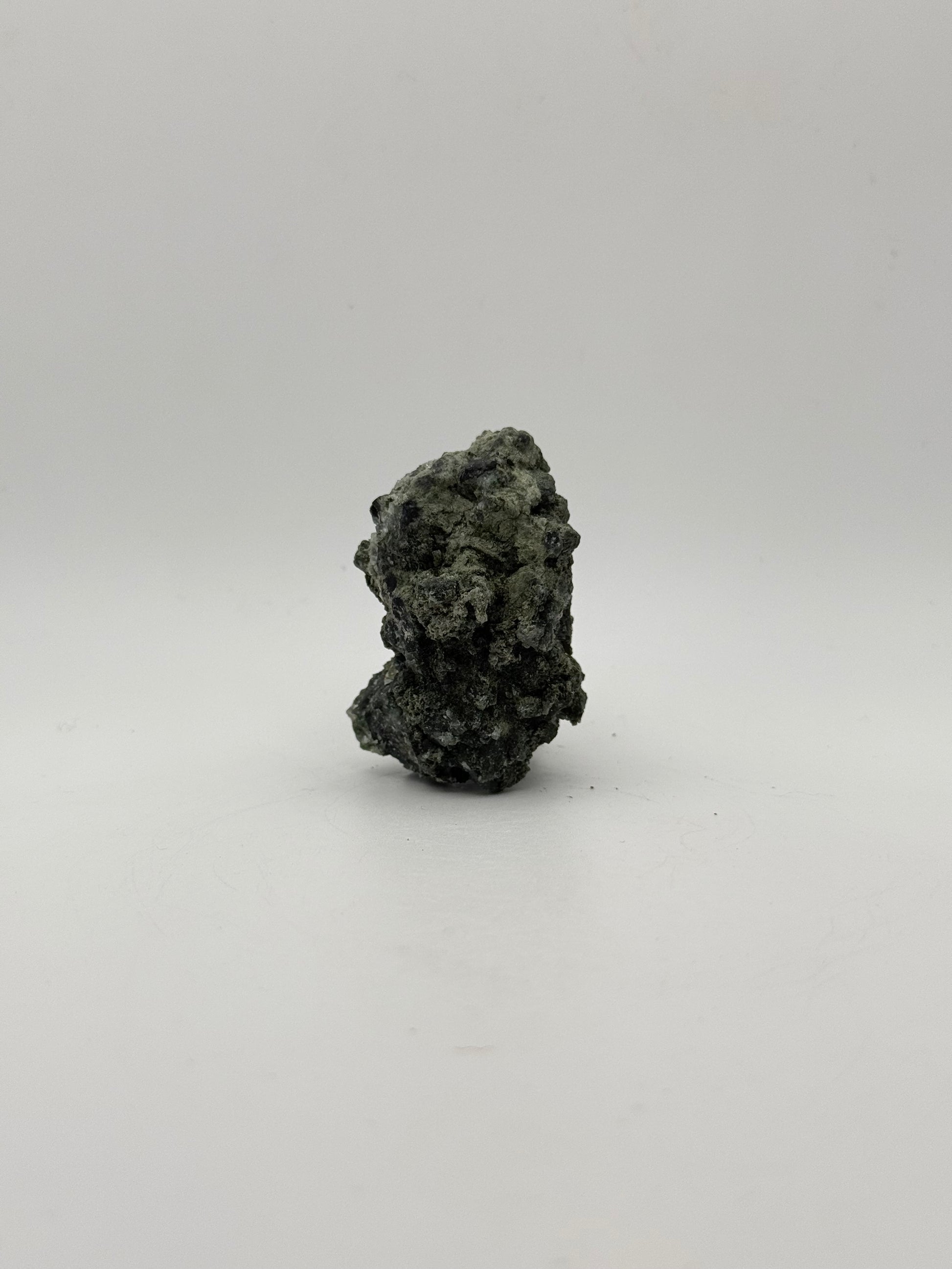 Raw prehnite specimen with amazing green color.