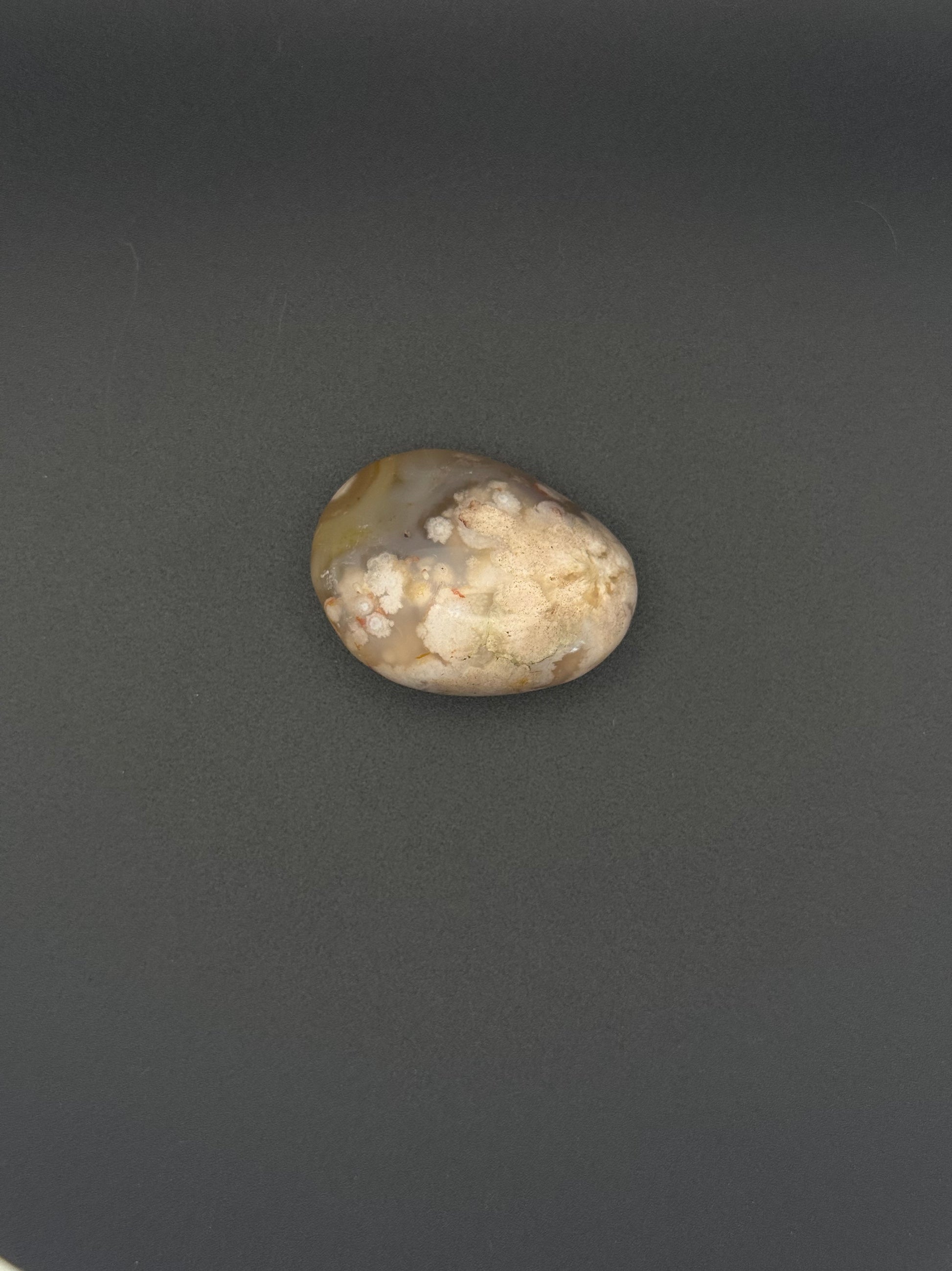 Flower agate polished crystal palm stone.