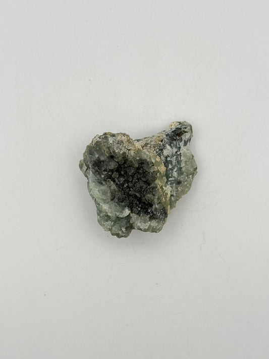 Raw prehnite specimen with amazing green color.