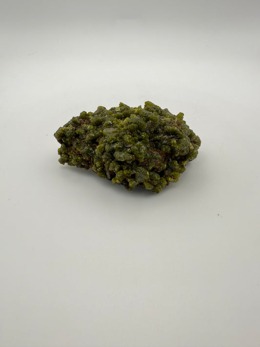 Epidote crystal cluster with good green color.