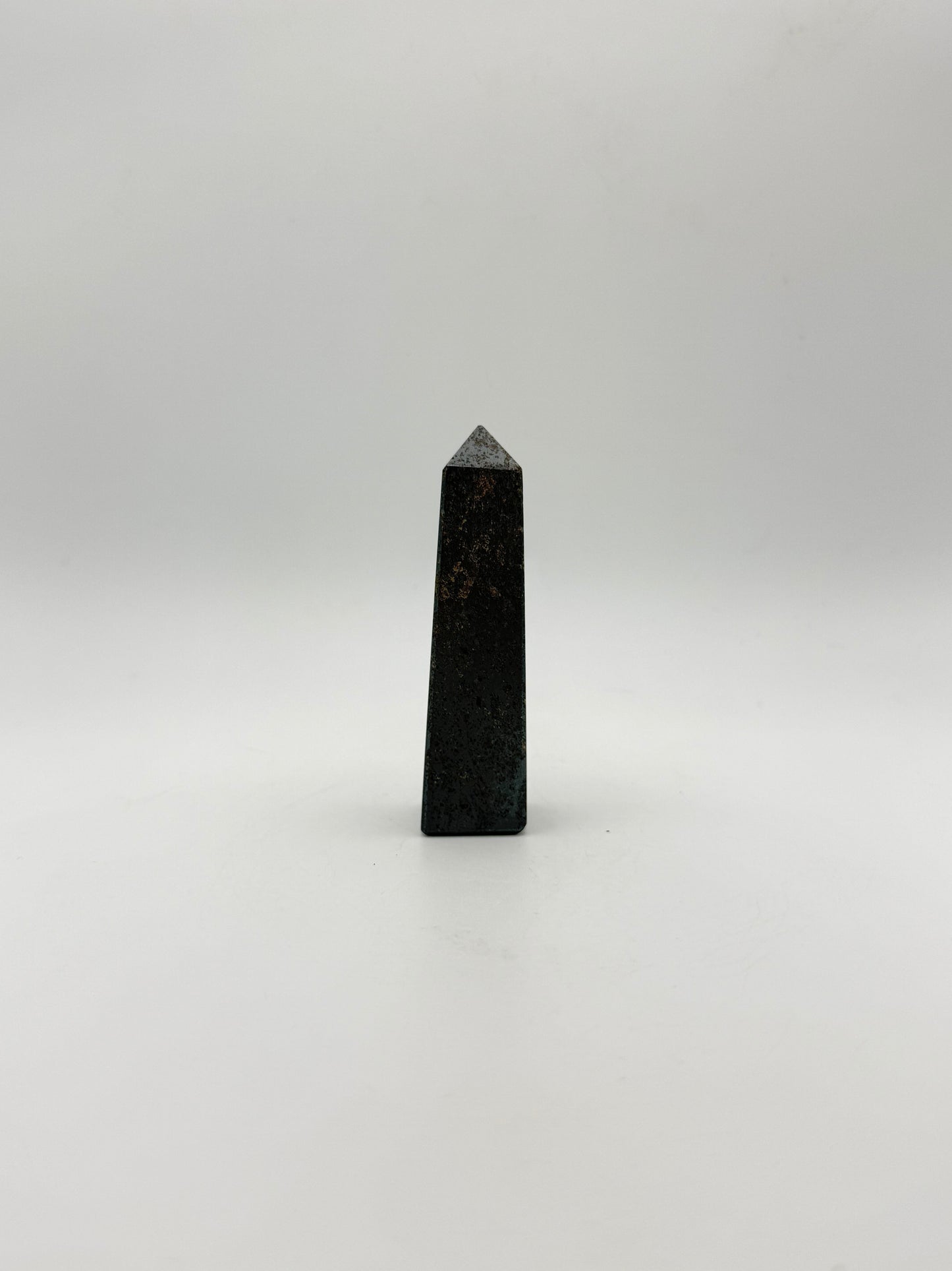 four sided hematite tower.