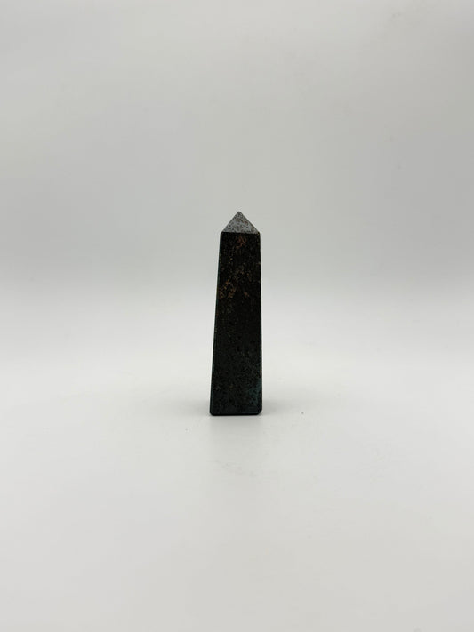 four sided hematite tower.