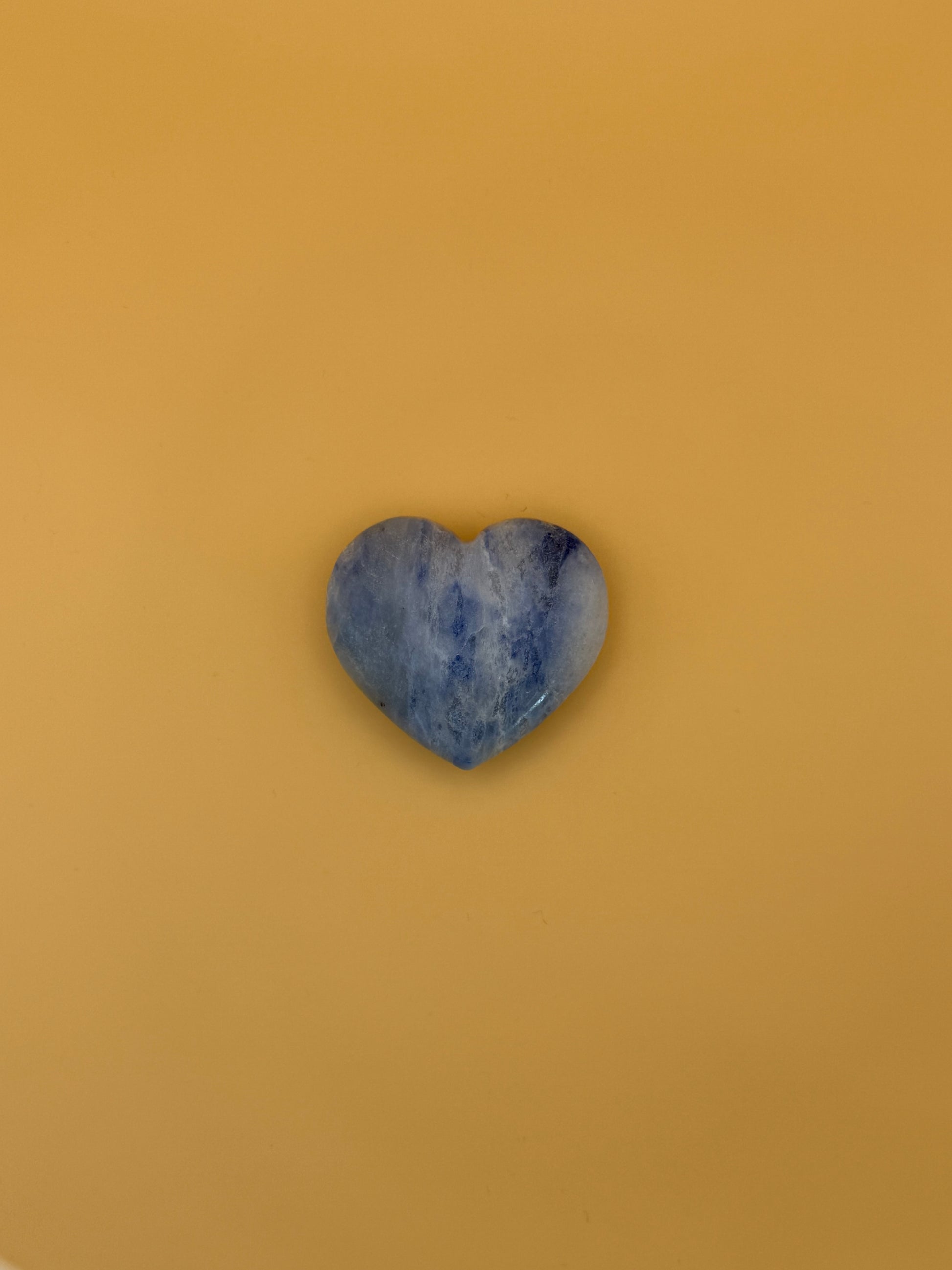 Afghanite heart-shaped stone. Approximately 1 7/8inches by 1 3/4inches big