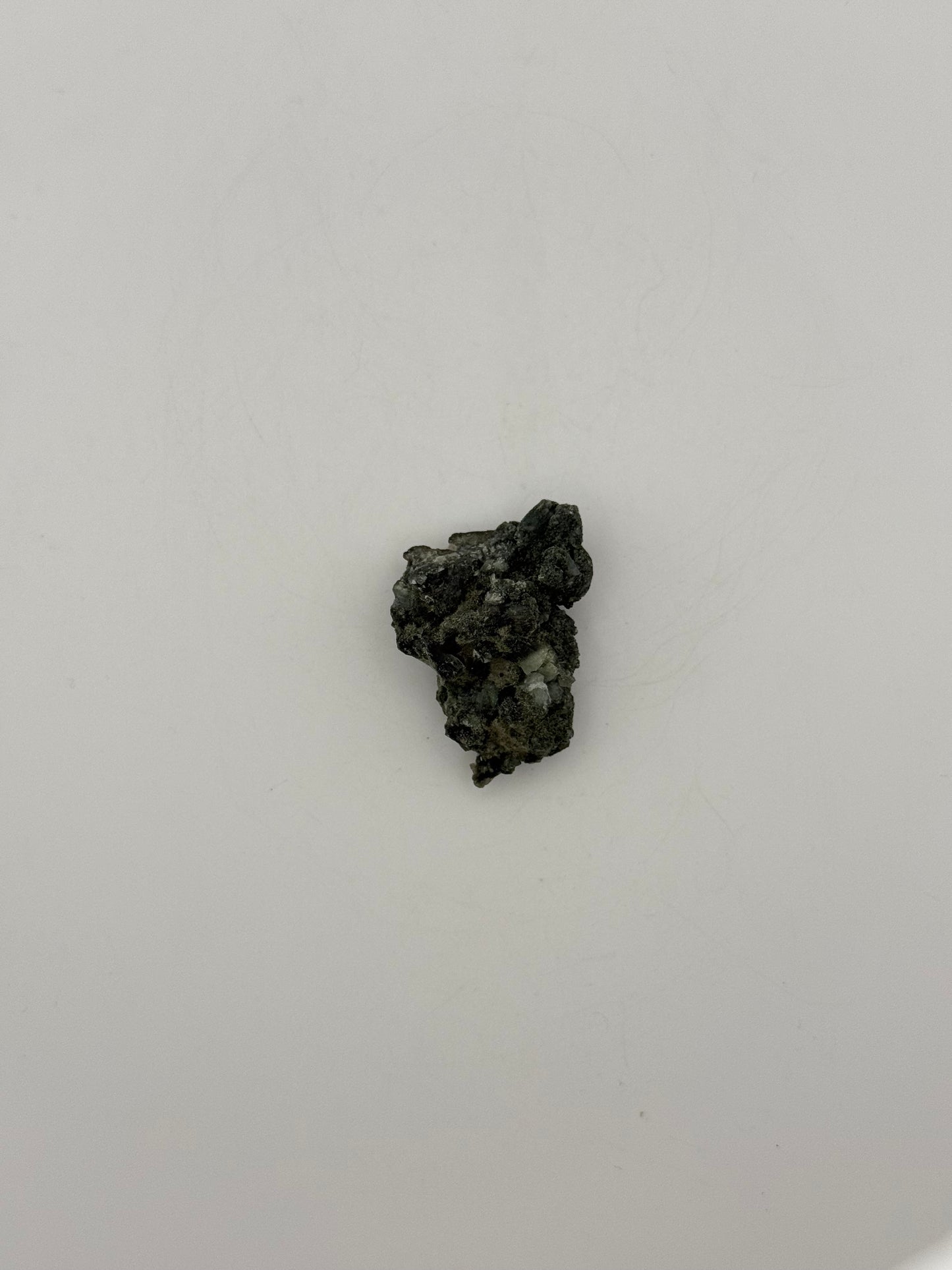 Raw prehnite specimen with amazing green color.