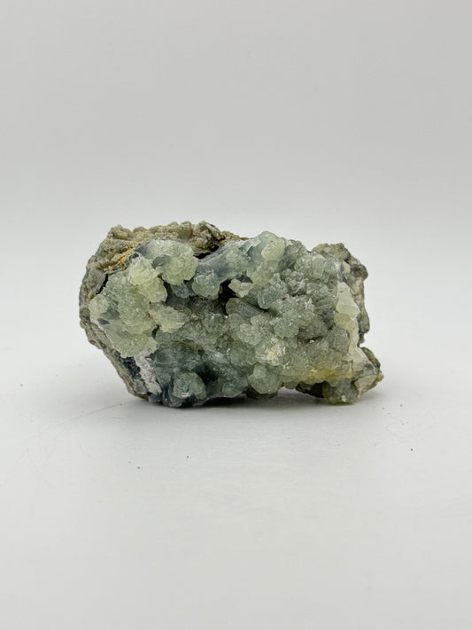 Raw prehnite specimen with amazing green color.
