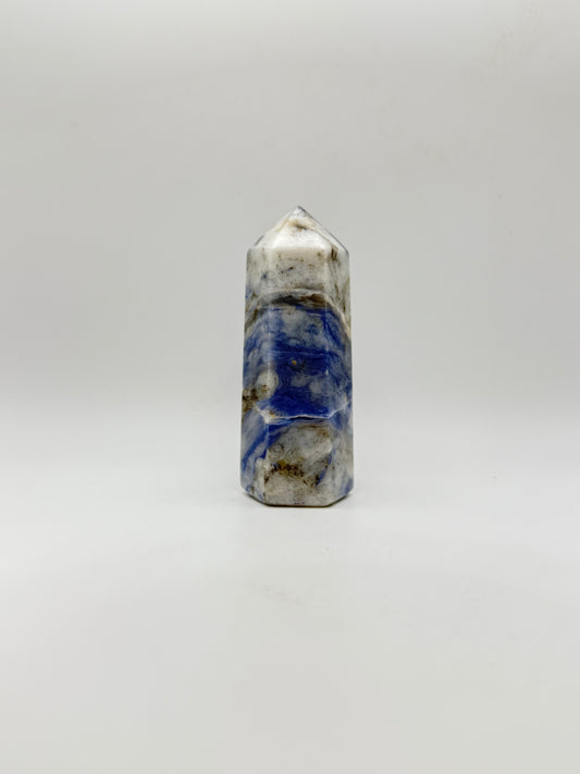 Afghanite six sided tower. Height of 3 3/4 inches, width of 1 1/2 inches.