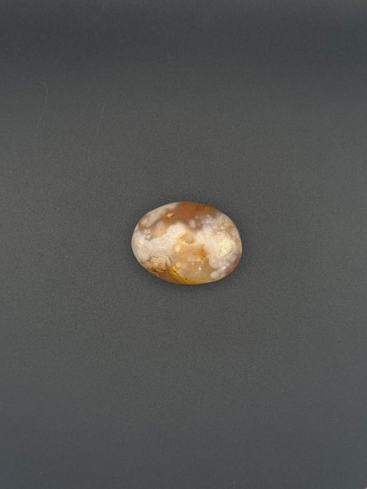 Flower agate polished crystal palm stone.