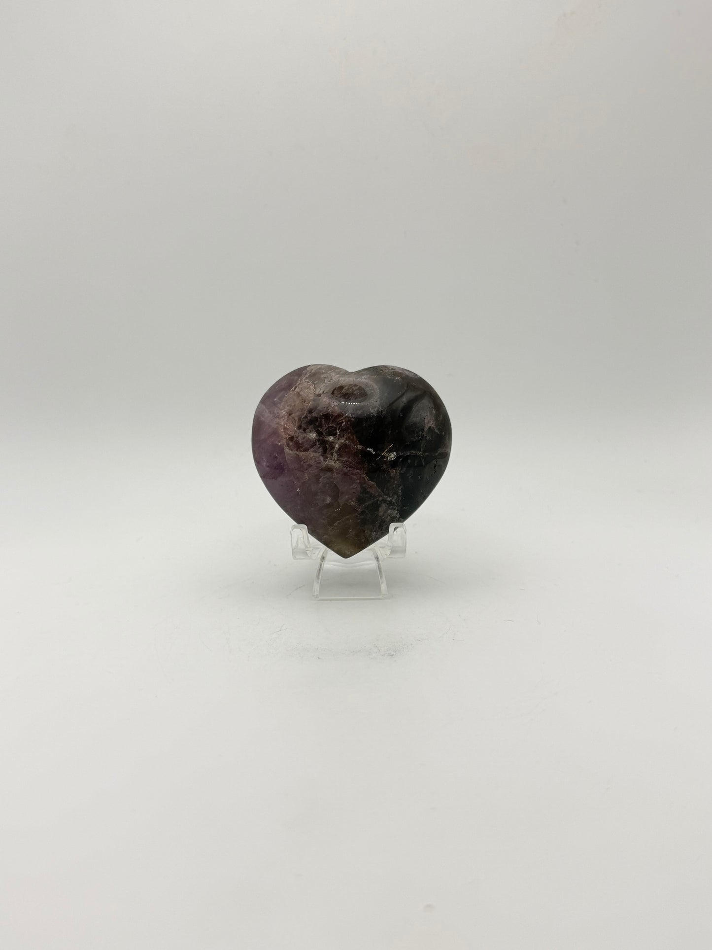 Polished super 7 in the shape of a heart.