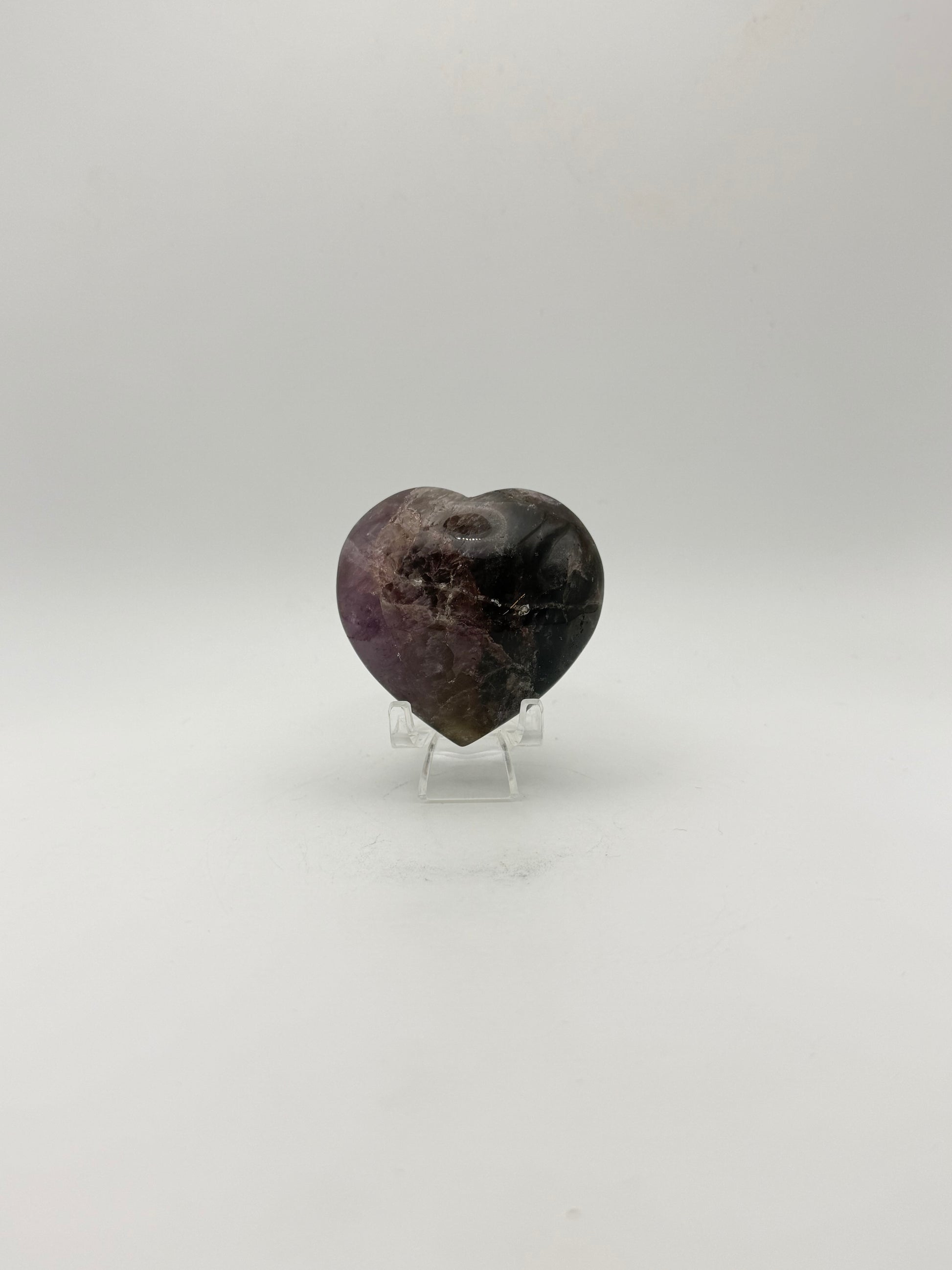 Polished super 7 in the shape of a heart.