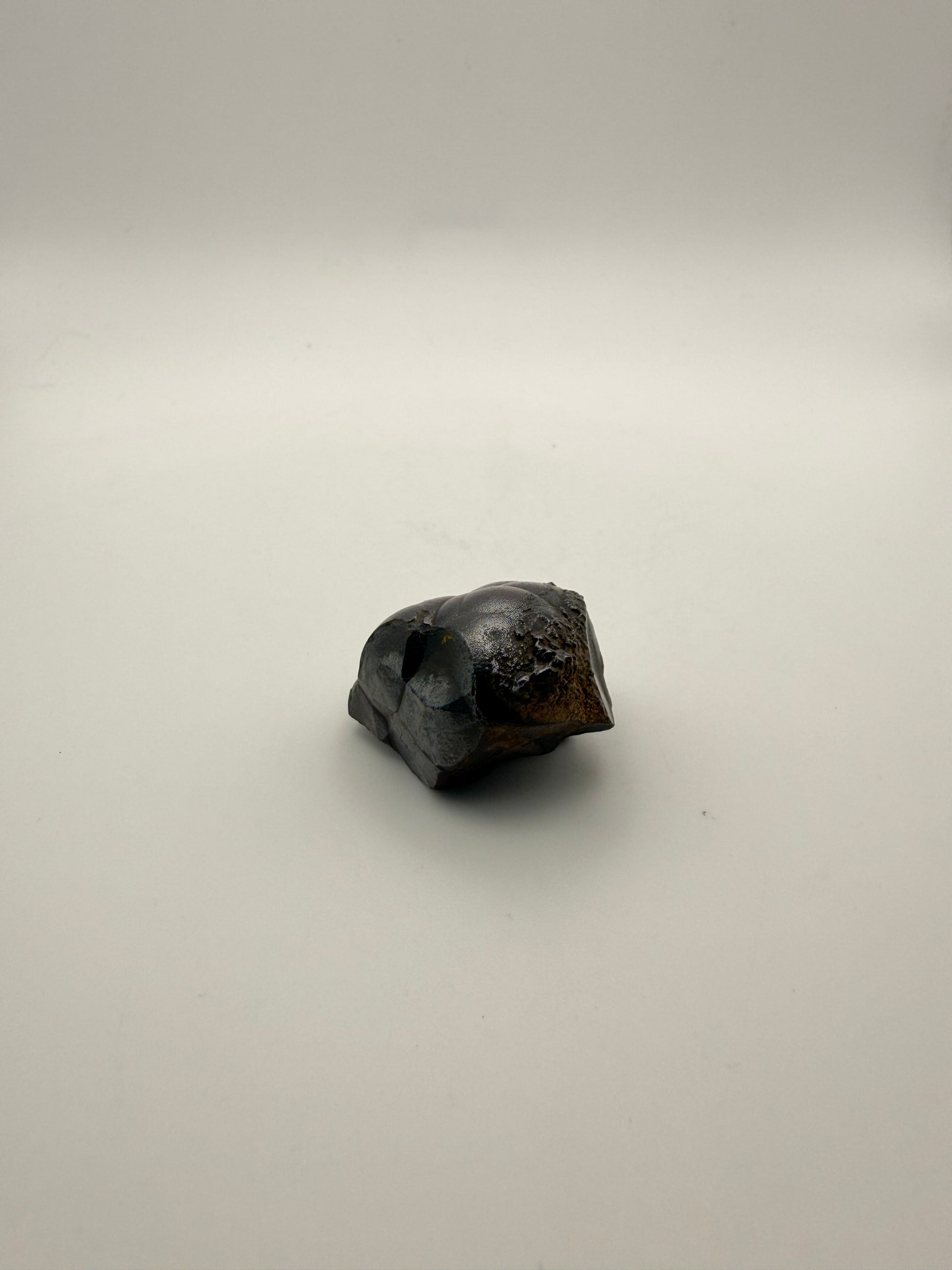 Small raw hematite specimen.