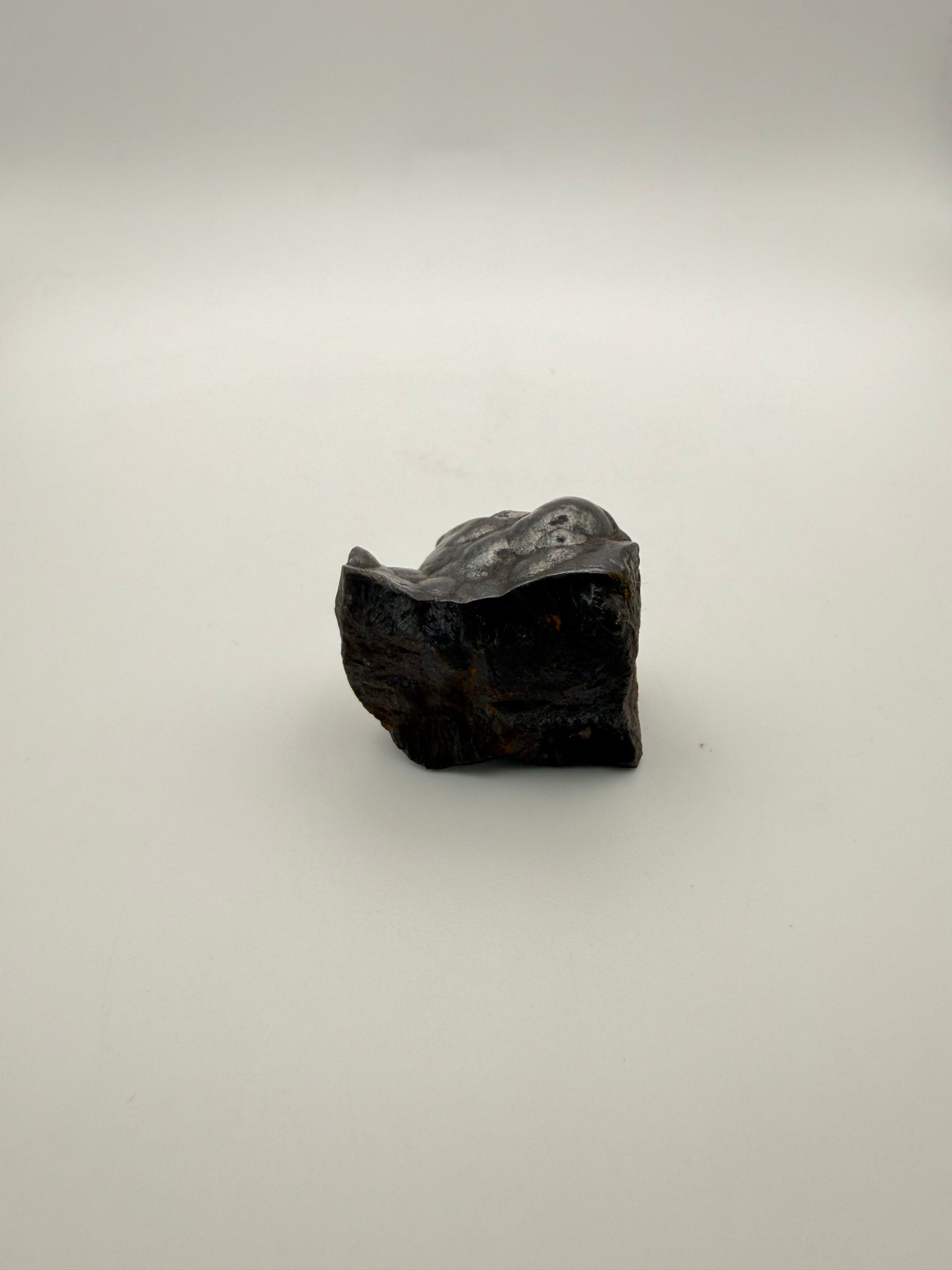 Small raw hematite specimen.