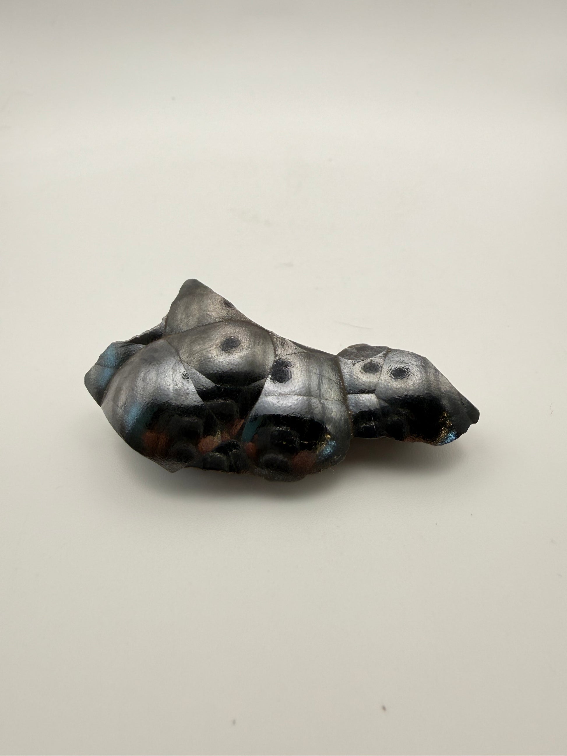 Small raw hematite specimen.