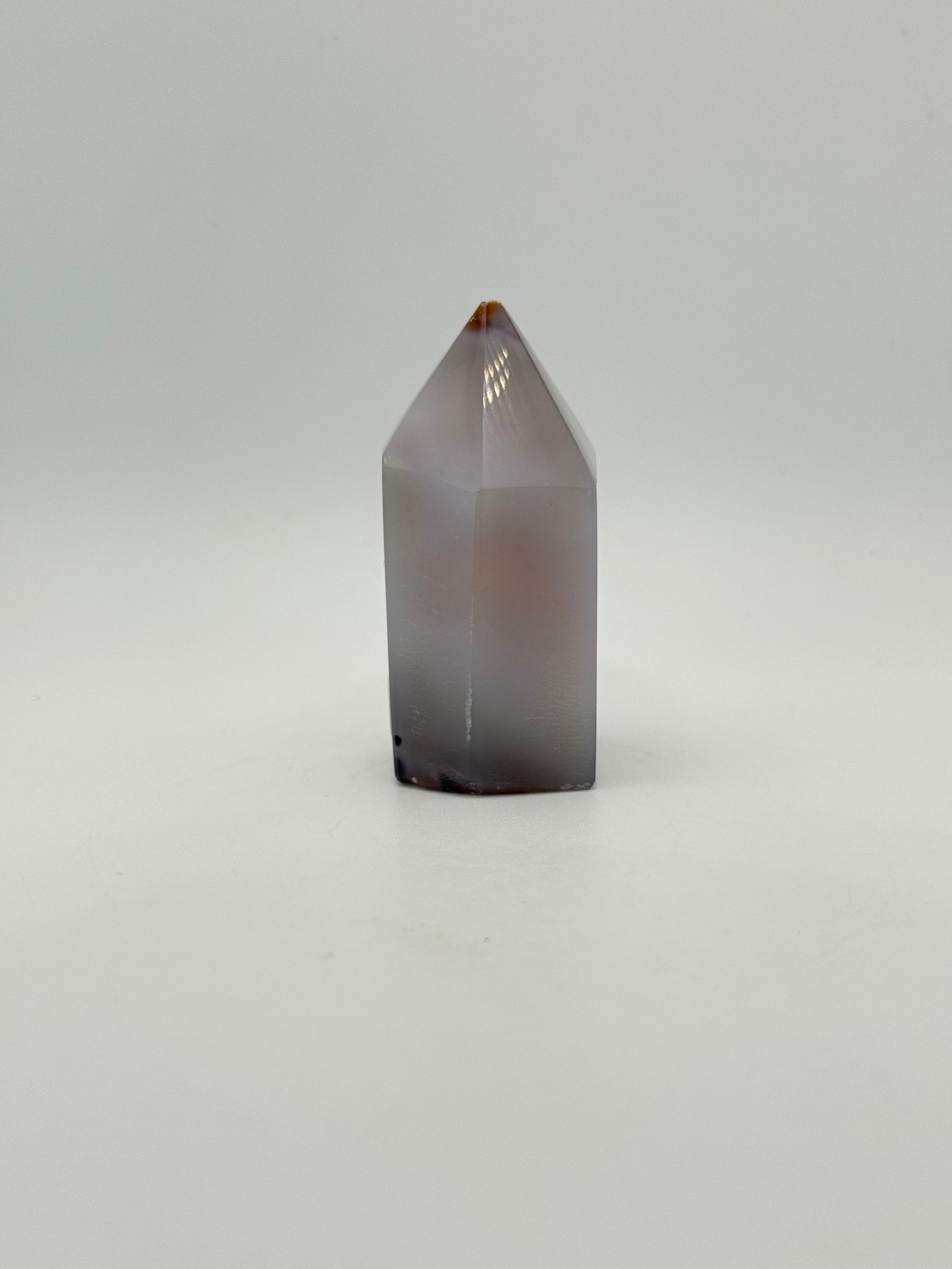 Polished druzy agate tower. About 2.5  inches tall.