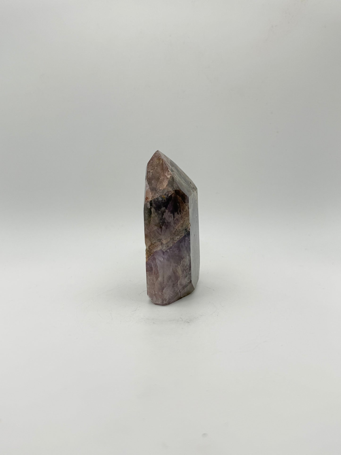 Polished super 7 in the shape of a tower.