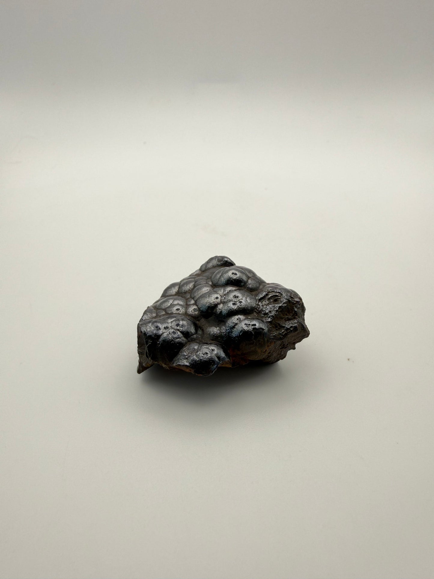 Small raw hematite specimen.