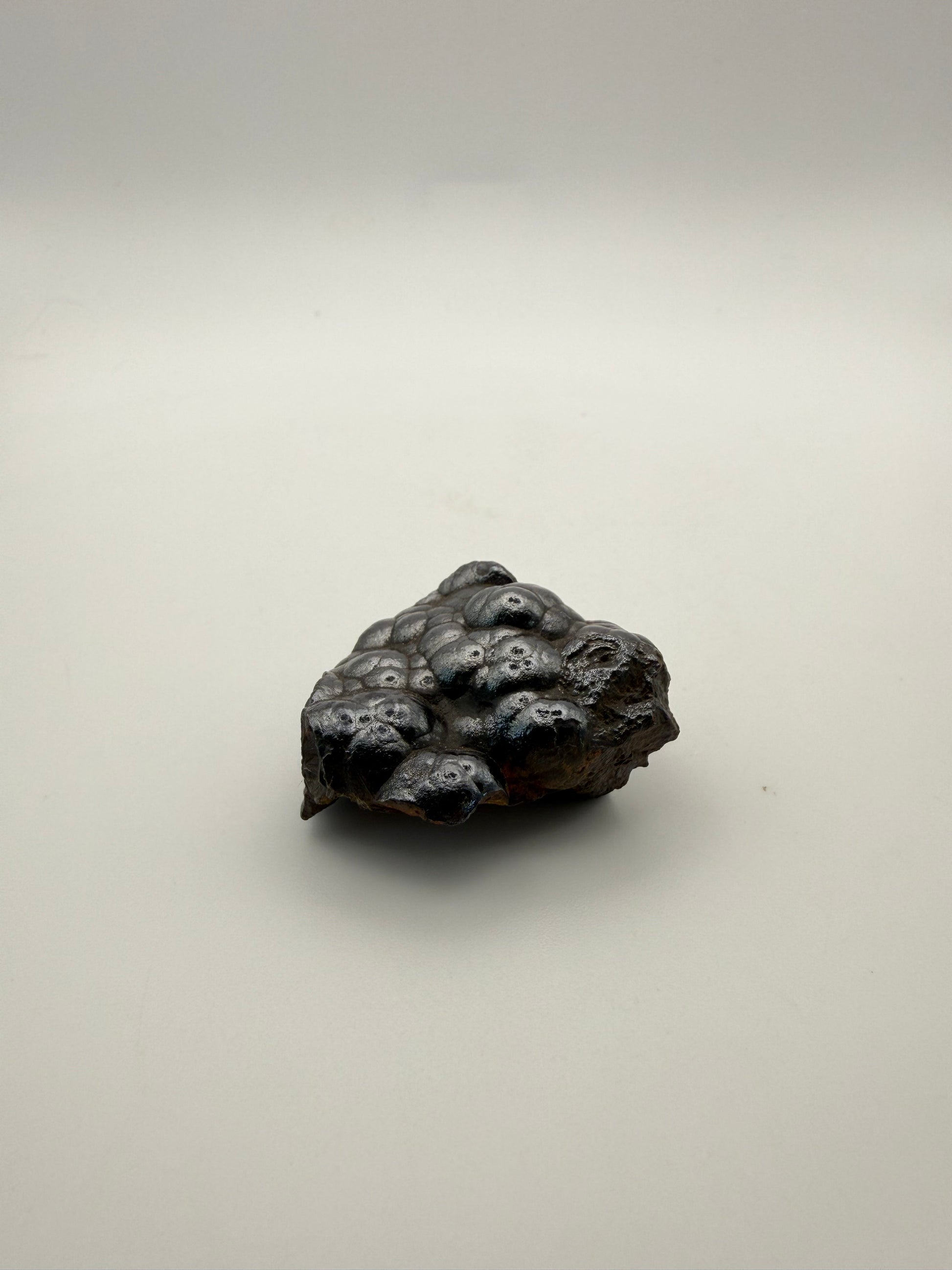 Small raw hematite specimen.