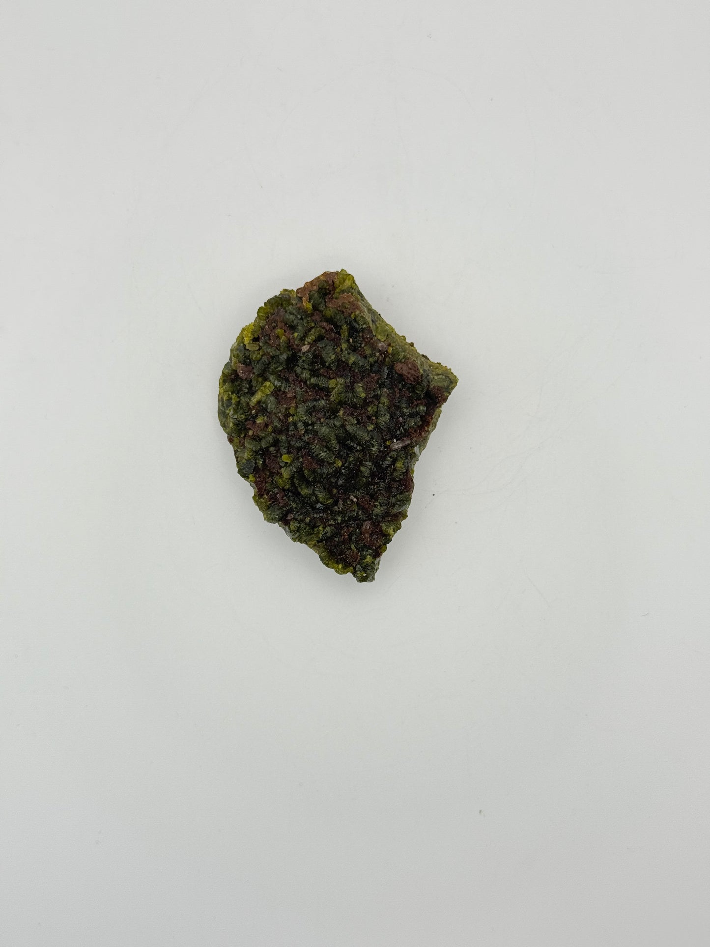 Epidote crystal cluster with good green color.