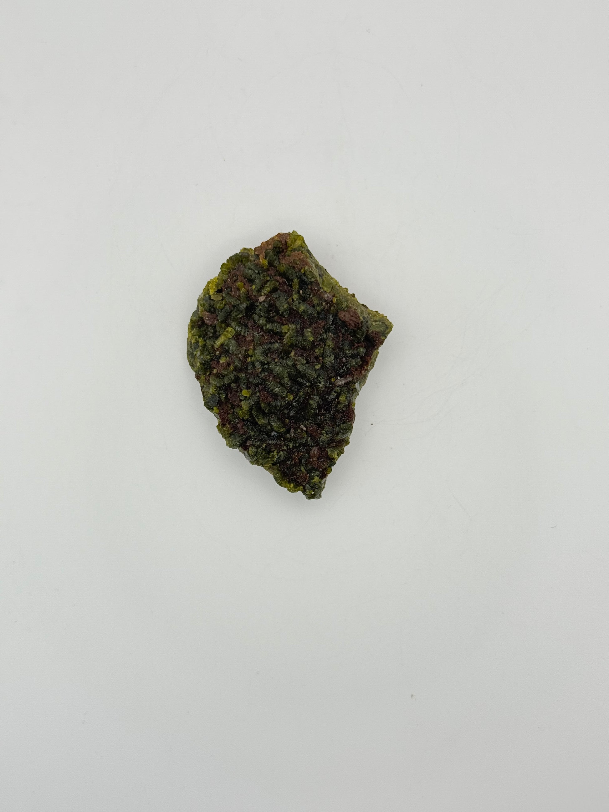 Epidote crystal cluster with good green color.