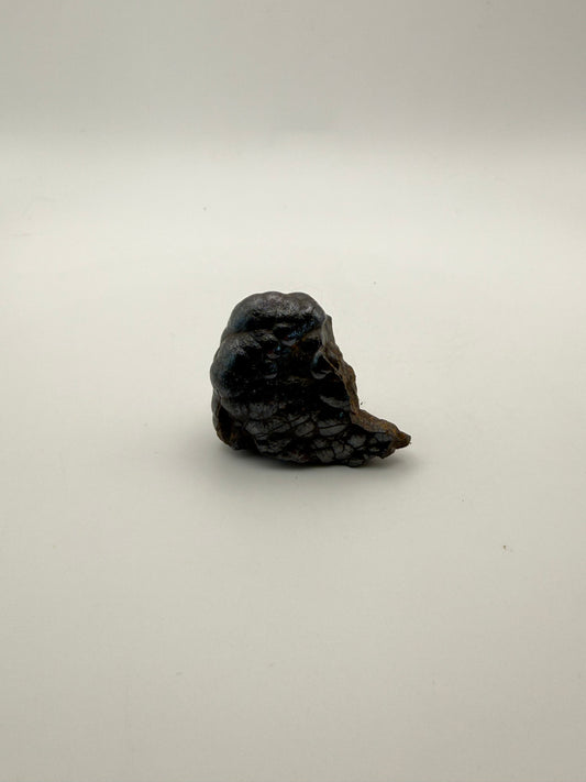 Small raw hematite specimen.