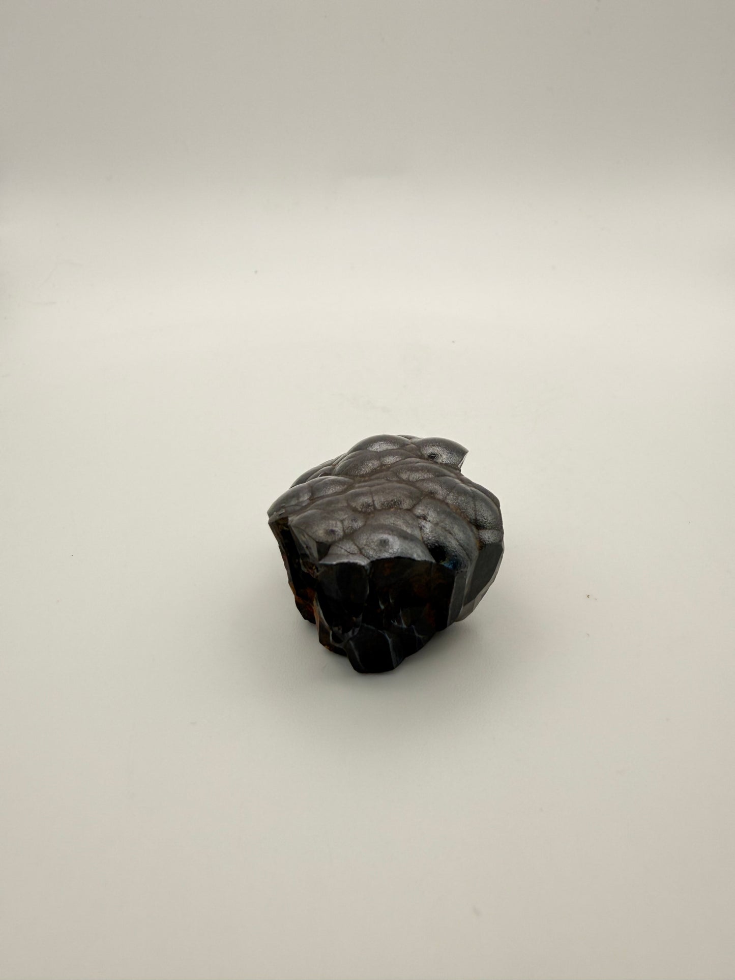Small raw hematite specimen.