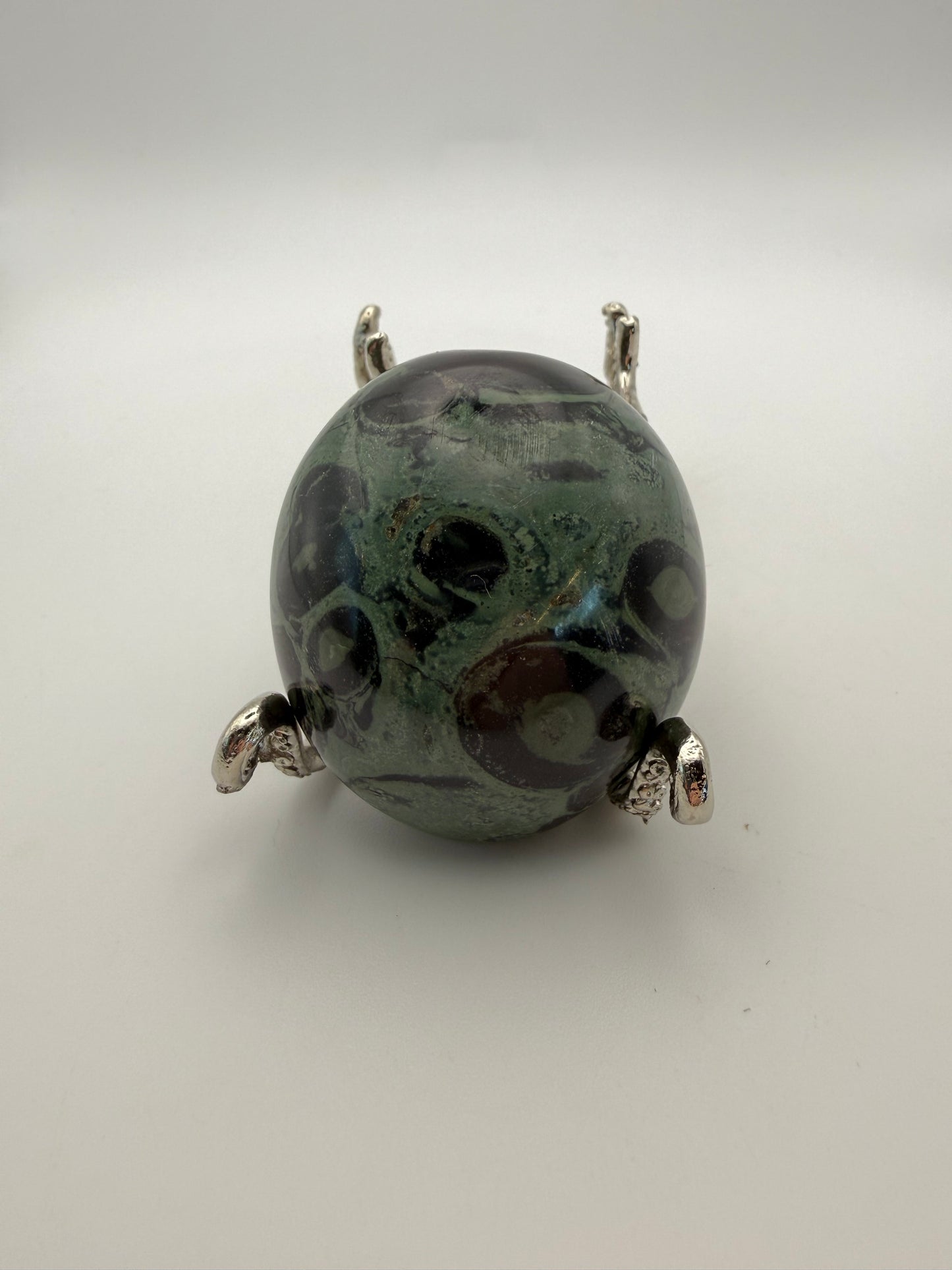 Polished kambaba jasper palm stone.