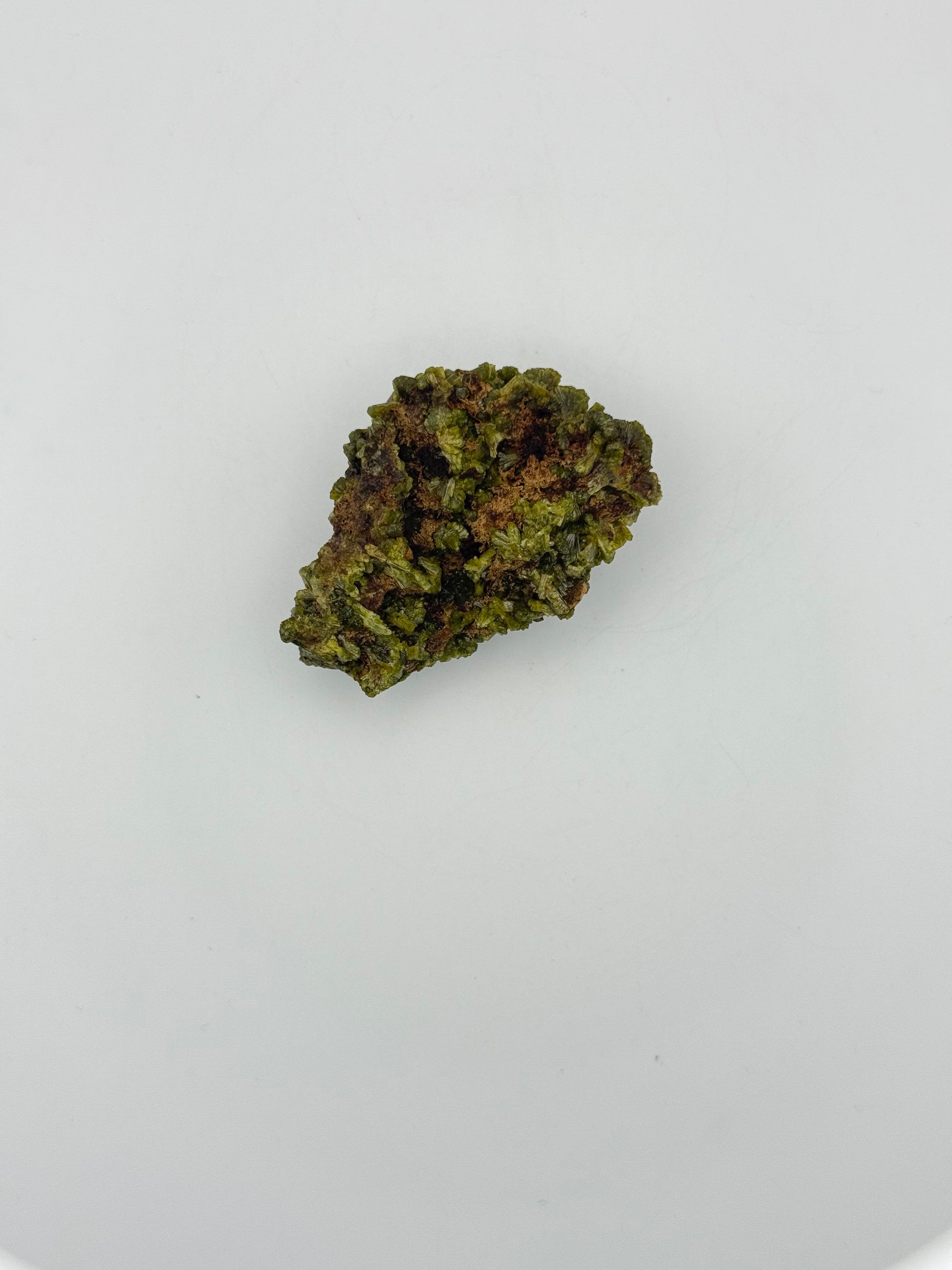Epidote crystal cluster with good green color.