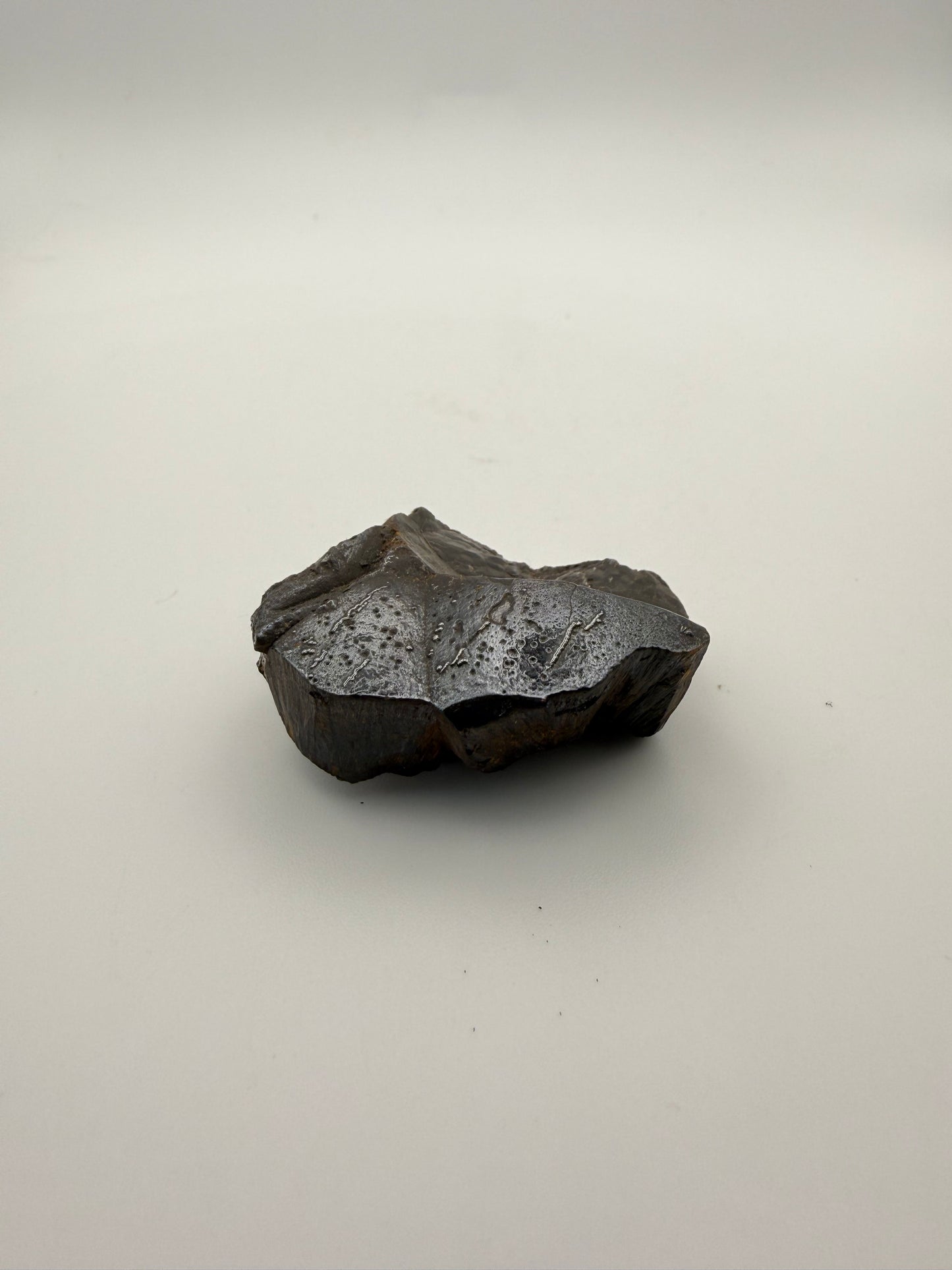Small raw hematite specimen.