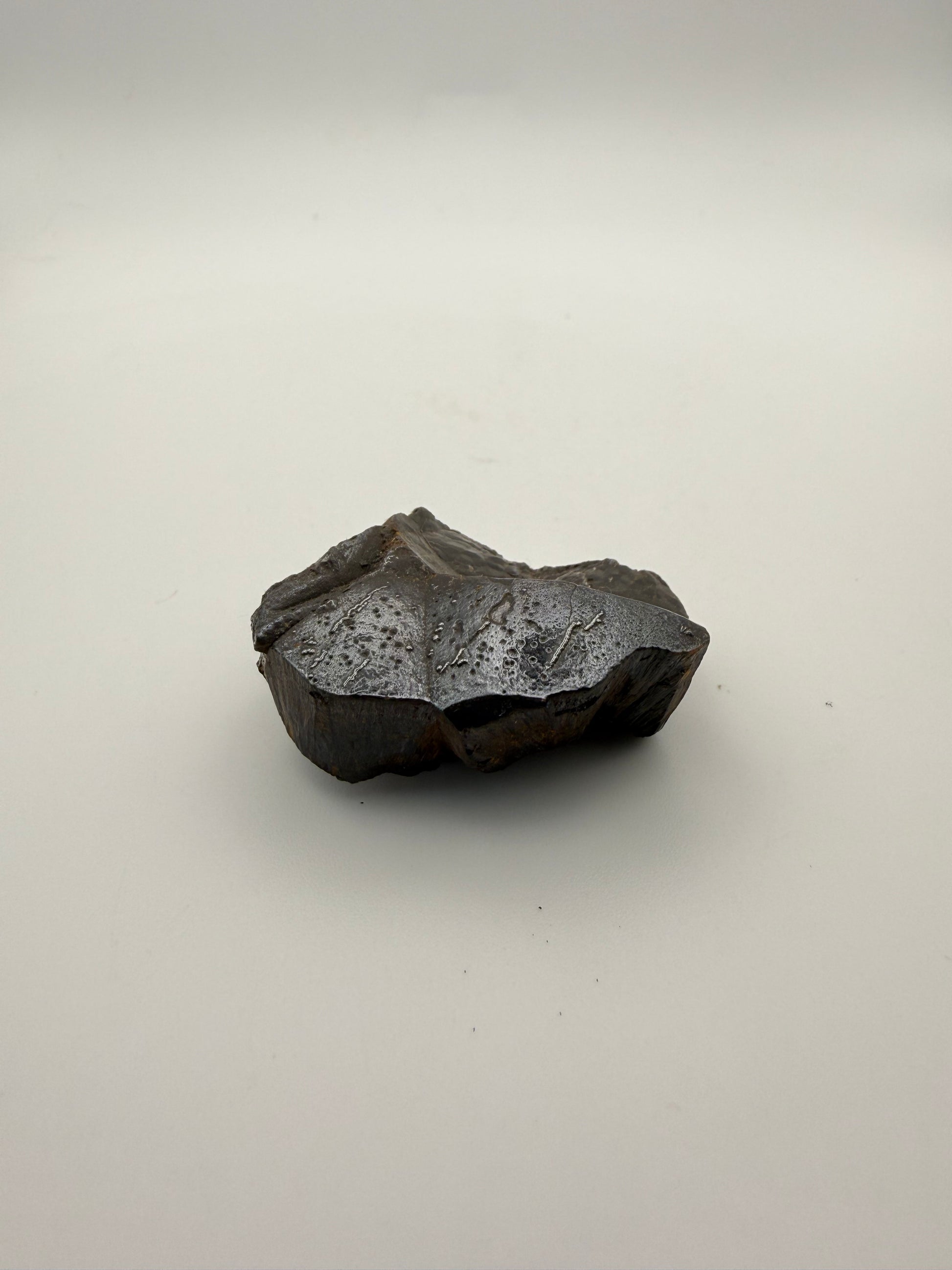 Small raw hematite specimen.