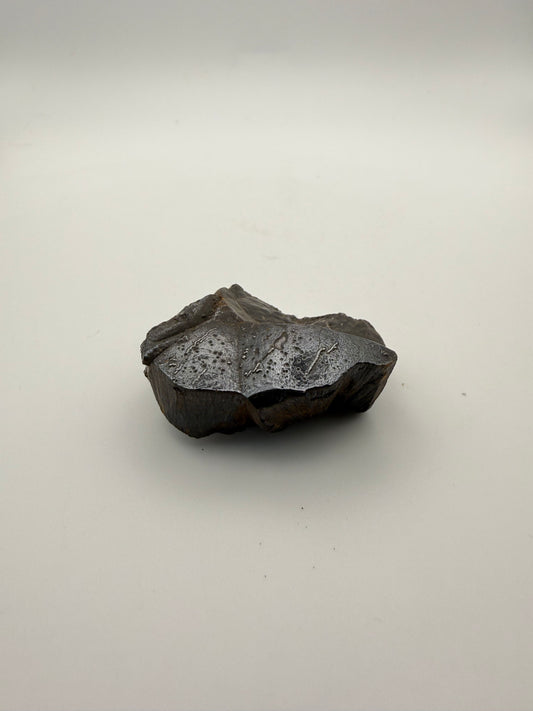 Small raw hematite specimen.