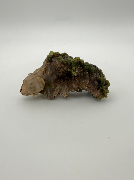 Epidote crystal cluster with good green color.