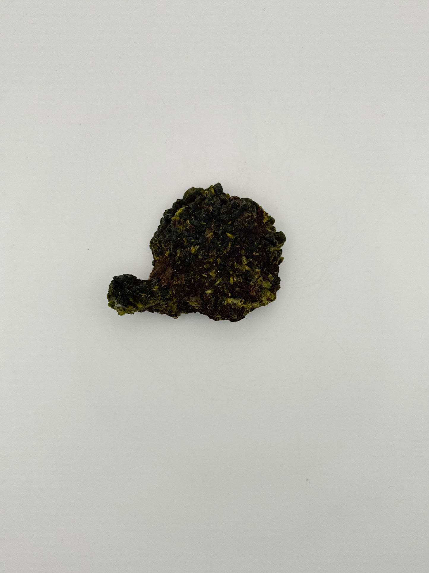 Epidote crystal cluster with good green color.