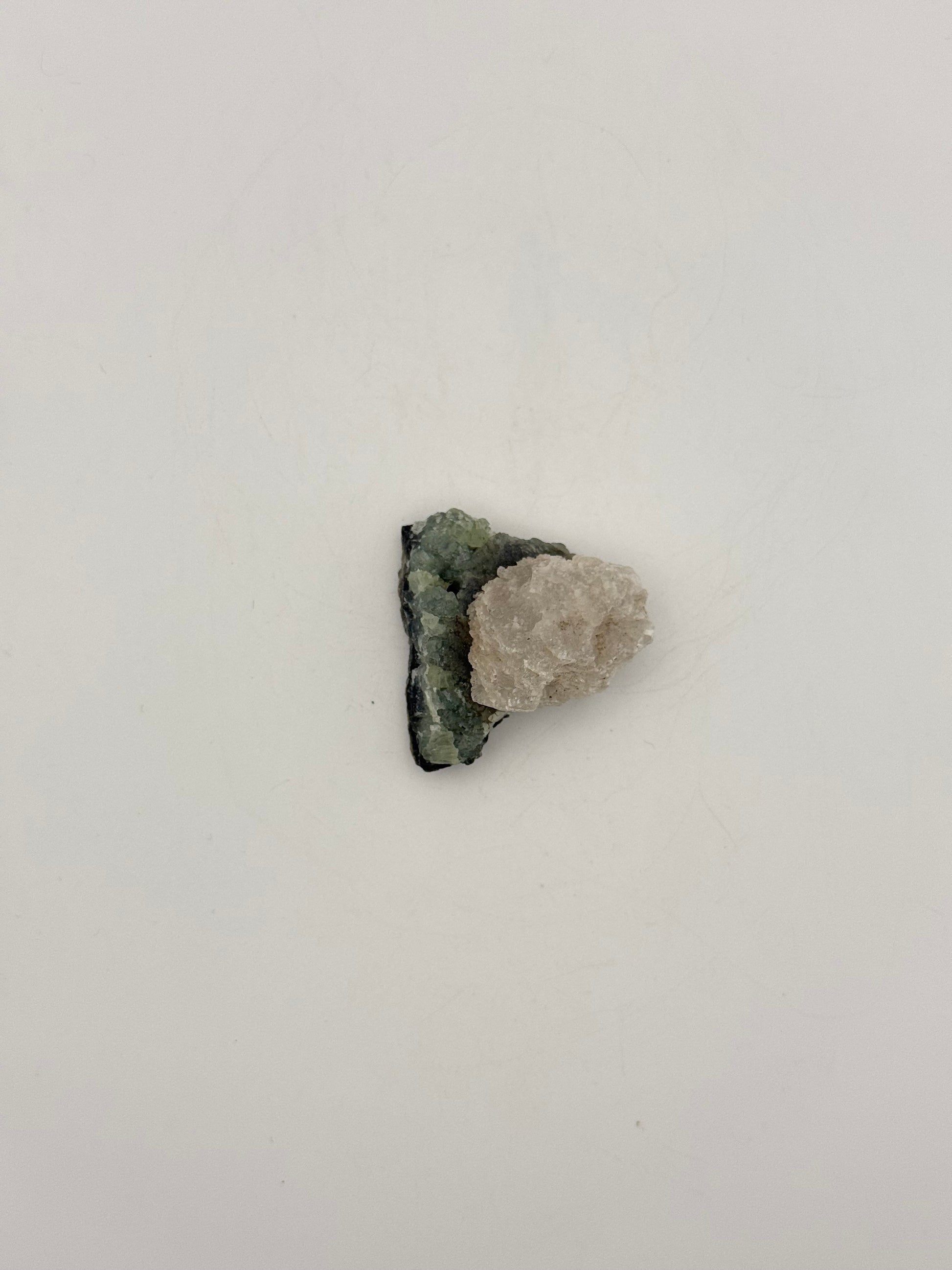 Raw prehnite specimen with amazing green color.