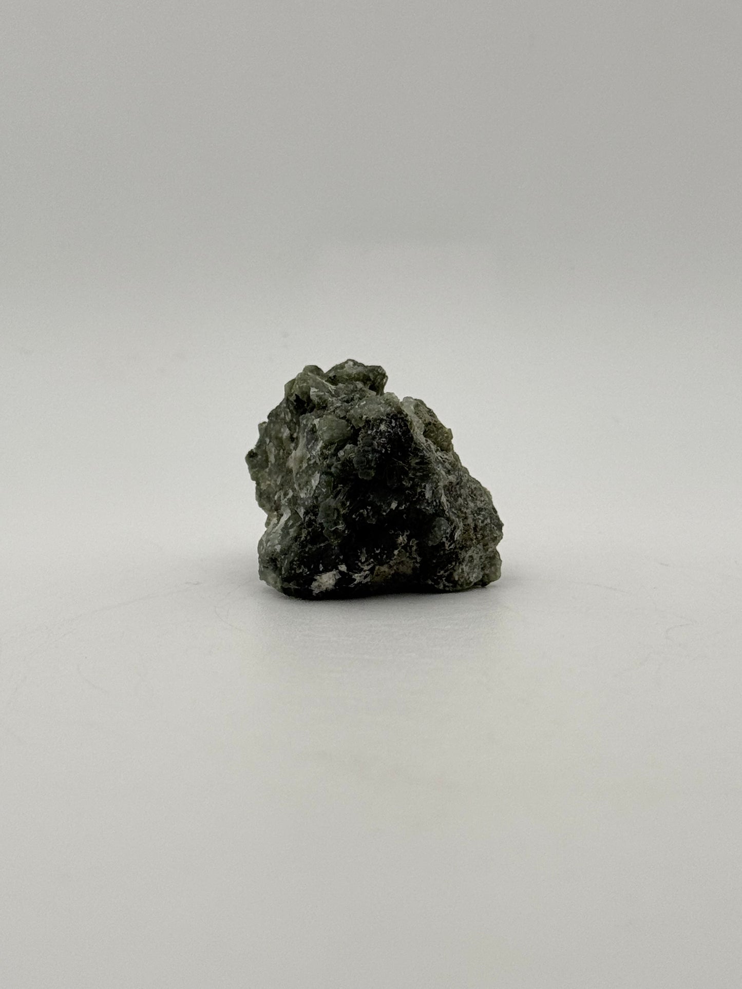 Raw prehnite specimen with amazing green color.