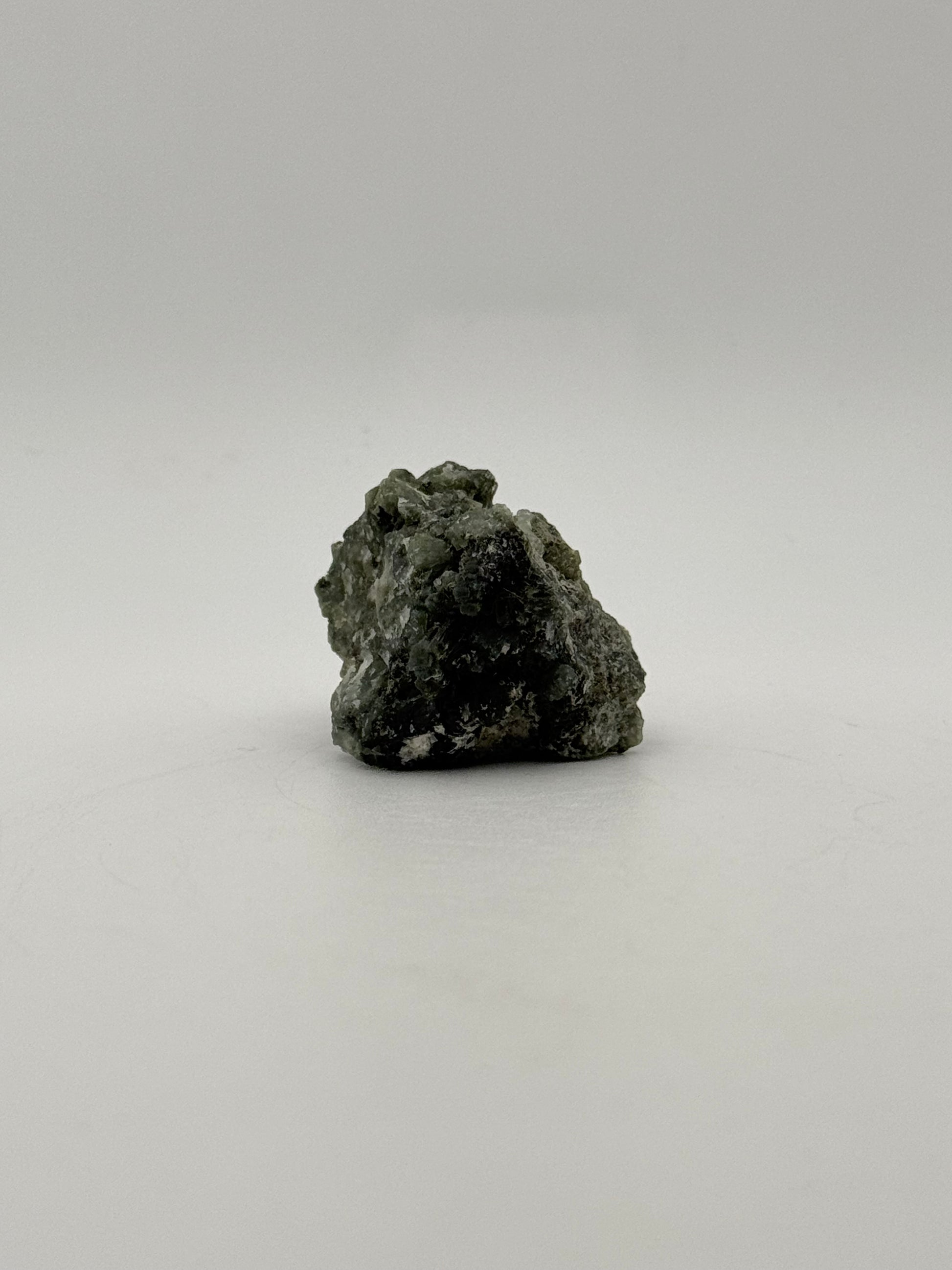 Raw prehnite specimen with amazing green color.