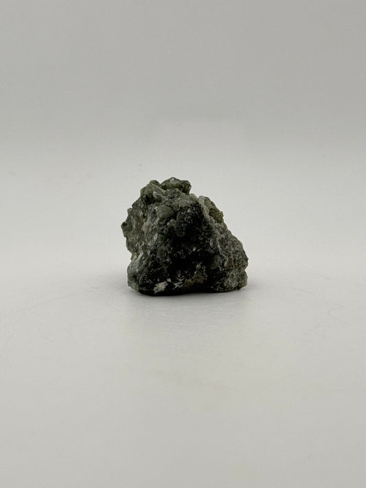 Raw prehnite specimen with amazing green color.