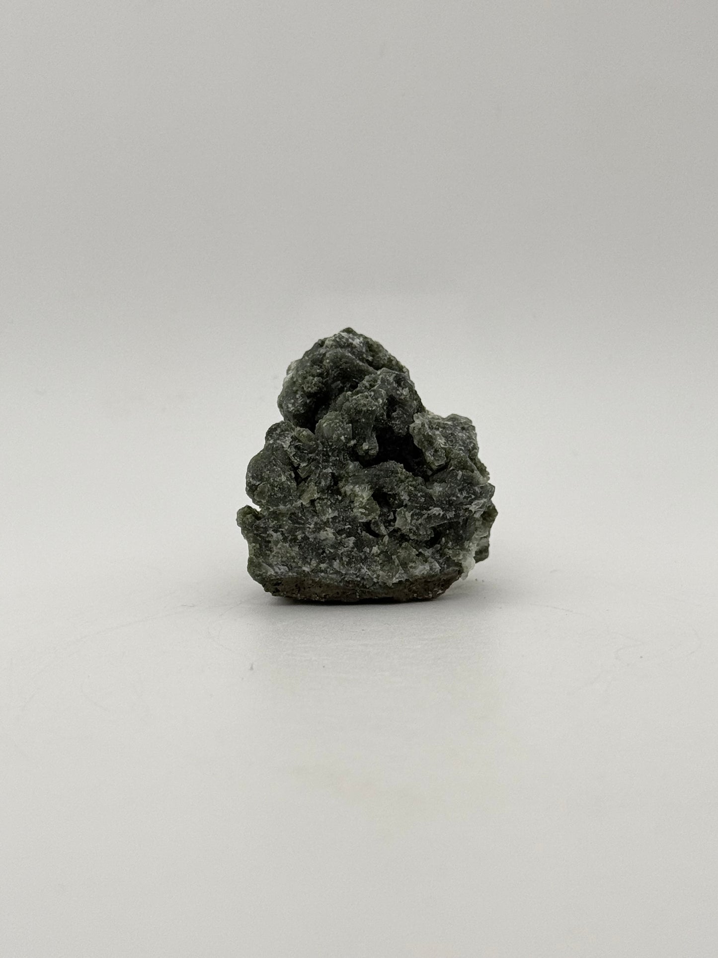 Raw prehnite specimen with amazing green color.